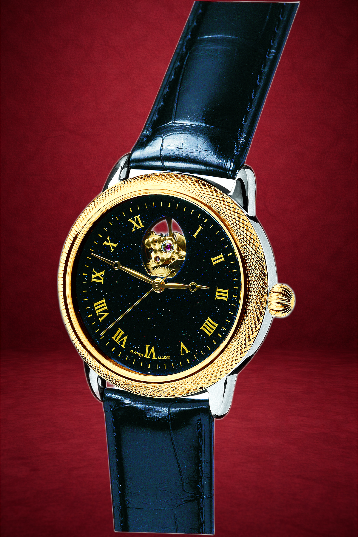 Theo Fabergé Series 4 chronometer model TF404 featuring 18 kt yellow gold bezel, sterling silver case and stellar goldstone dial with the iconic Fabergé egg cut-out aperture.