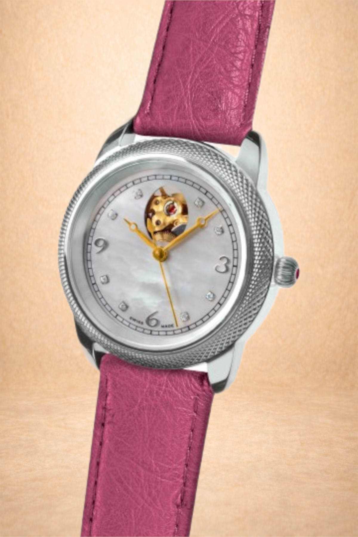 A wristwatch with a pink leather strap, a silver bezel, and a mother-of-pearl dial featuring diamond markers. The watch face has a small opening displaying a moving dog figure.