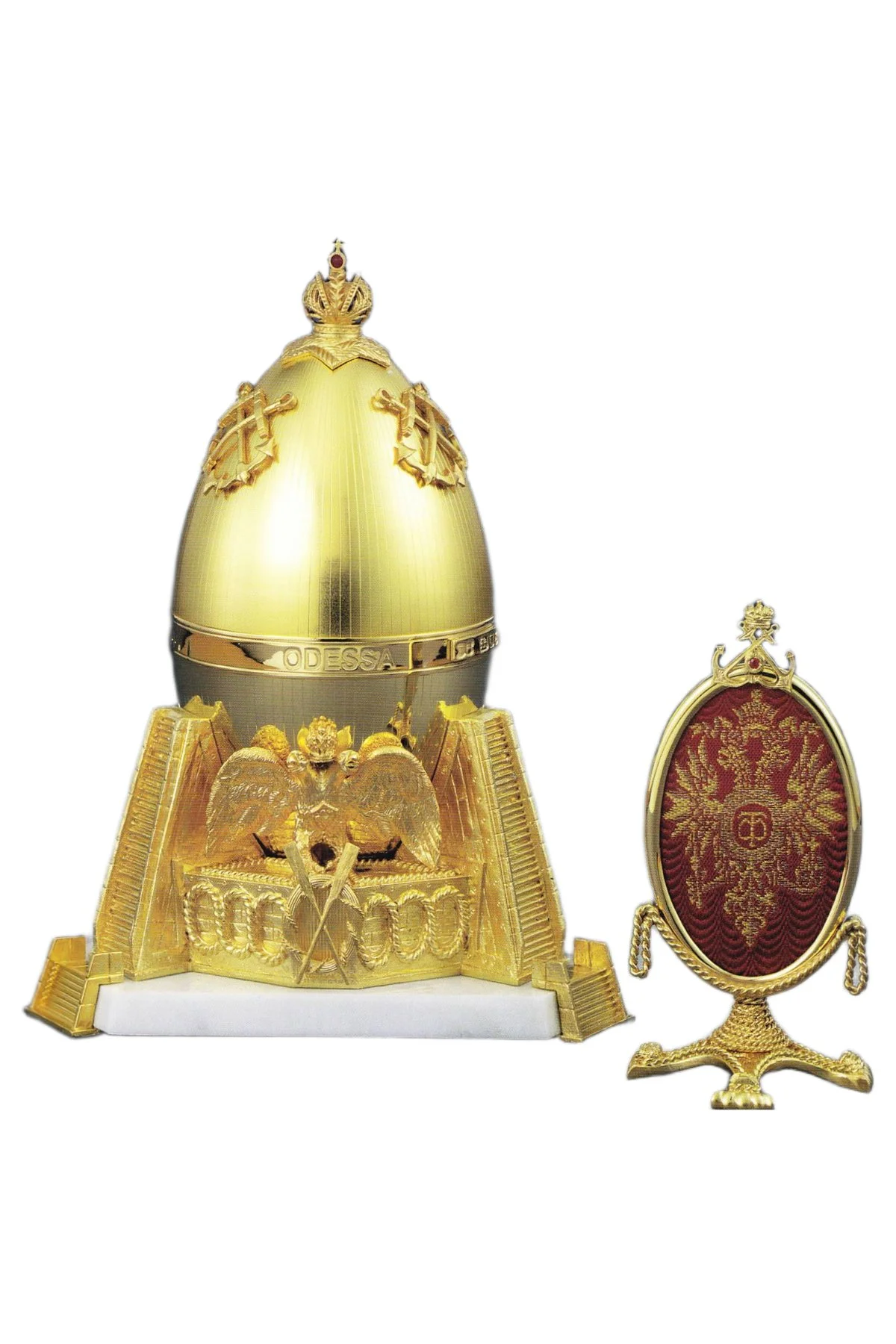 The Odessa Egg by Theo Fabergé, shown open to reveal its surprise.