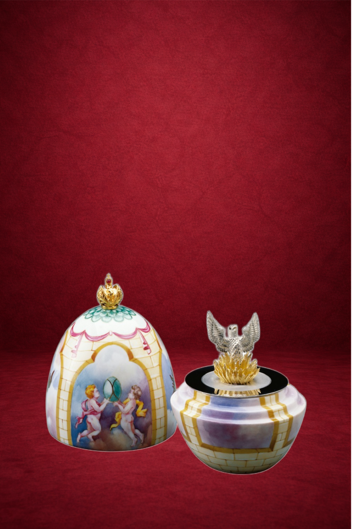 Phoenix Egg creation by Theo Fabergé celebrating the Romanov dynasty with elaborate enamel and gold decoration.