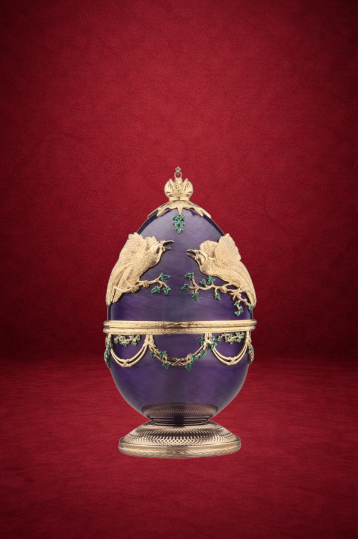 Bird of Paradise Egg creation by Theo Fabergé incorporating warm amber tones and handcrafted enamel and gold detailing.