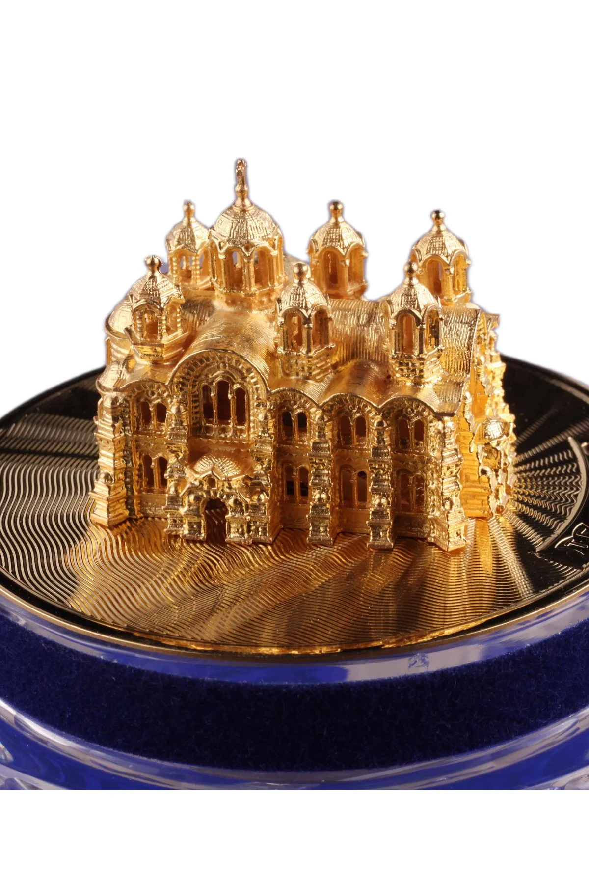 Russian Cathedral Egg open to reveal its handcrafted surprise.