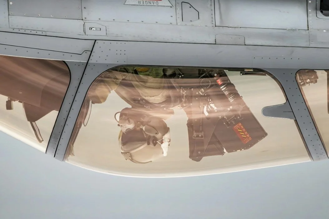 Fighter jet cockpit view from side profile showing inverted flight position illustrating how accumulation instincts become the wrong instrument panel when applied to retirement distribution