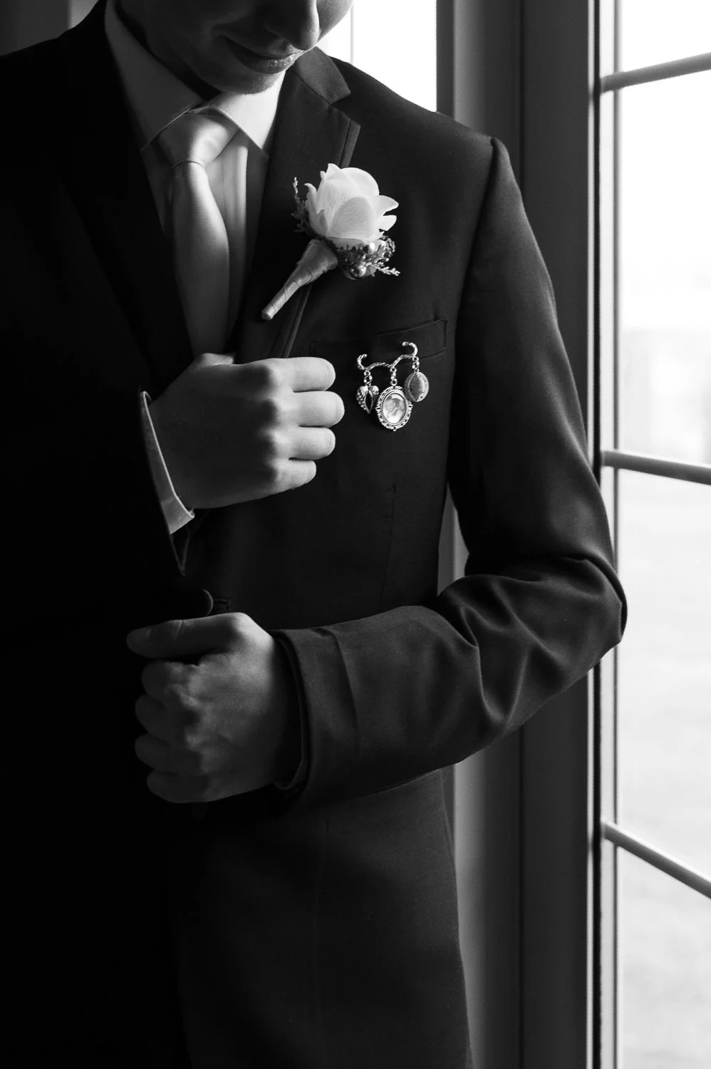 Groom boutonniere close up detail — fine art wedding photographer East Coast
