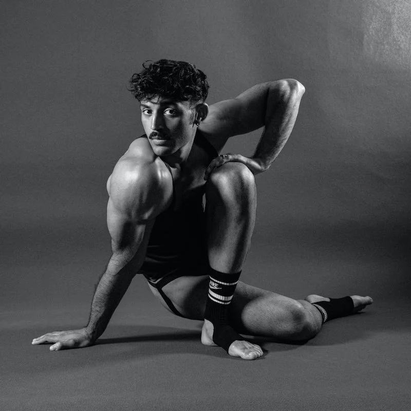 Ezra Roman posing in a black&white photo