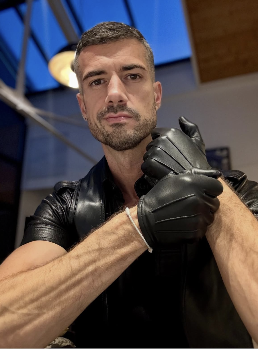Thibaud wearing black leather gloves