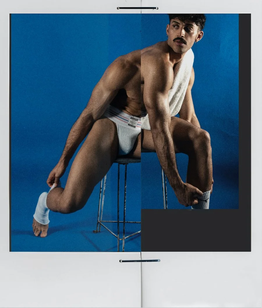 Ezra Roman poses in underwear