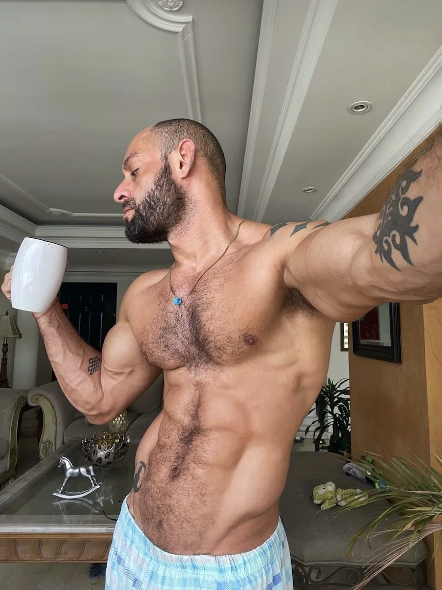 Dioner having coffee shirtless