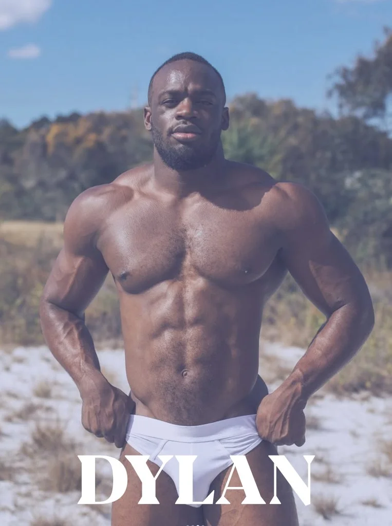 A shirtless man with a muscular build, standing outdoors, wearing white shorts, with the name 'Dylan' written across the bottom.