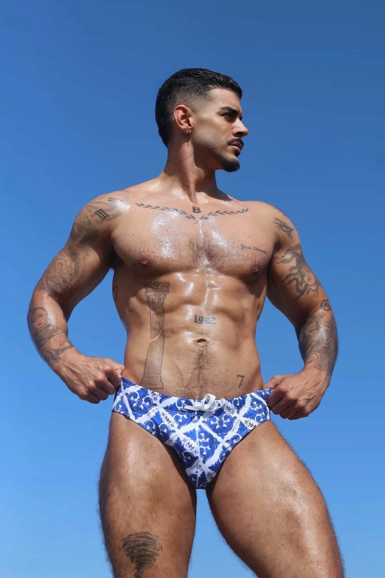 @thiagobloomm wearing Saligia swimwear