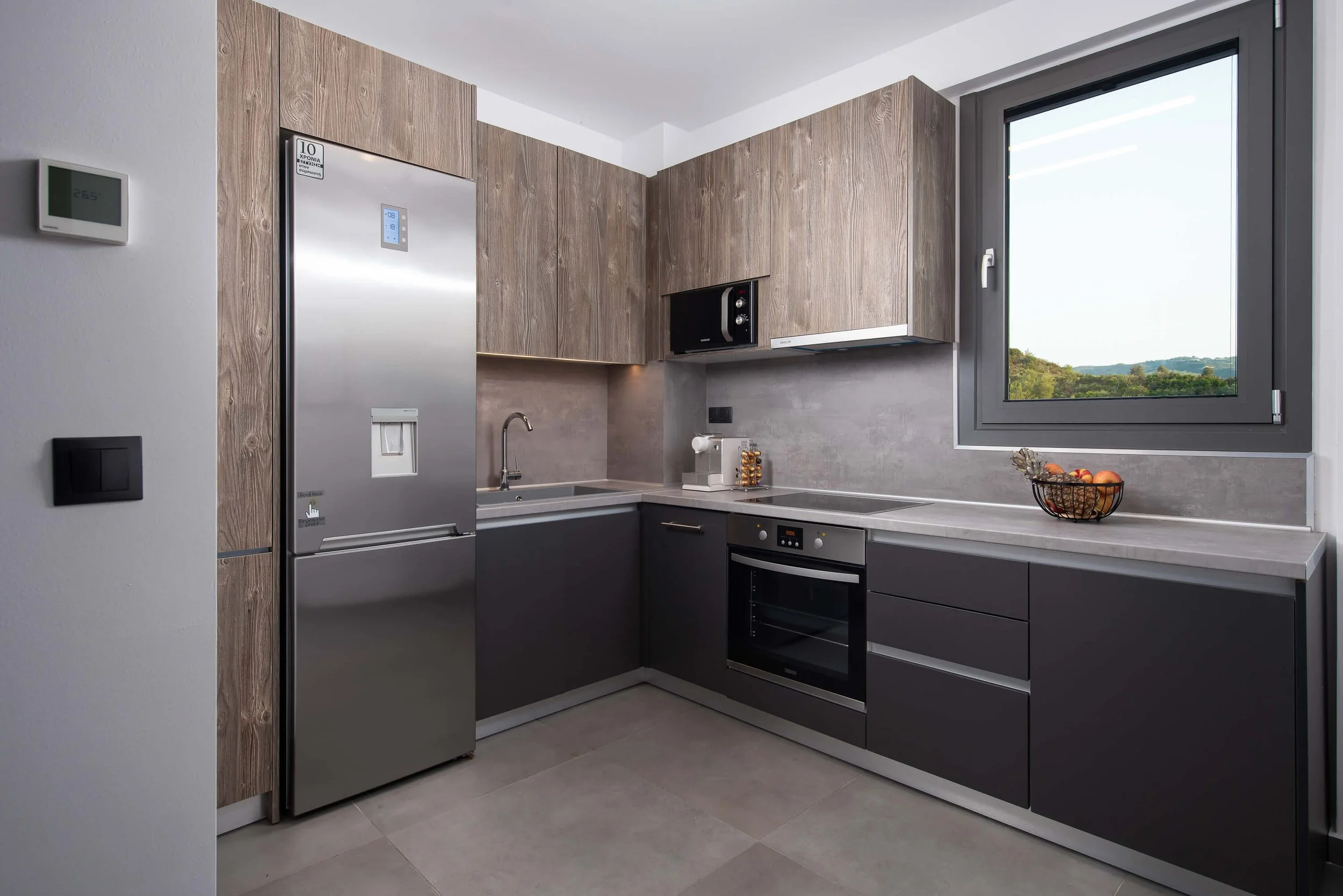 Fully equipped gourmet kitchen in Antonio Villa Halkidiki with high-end appliances