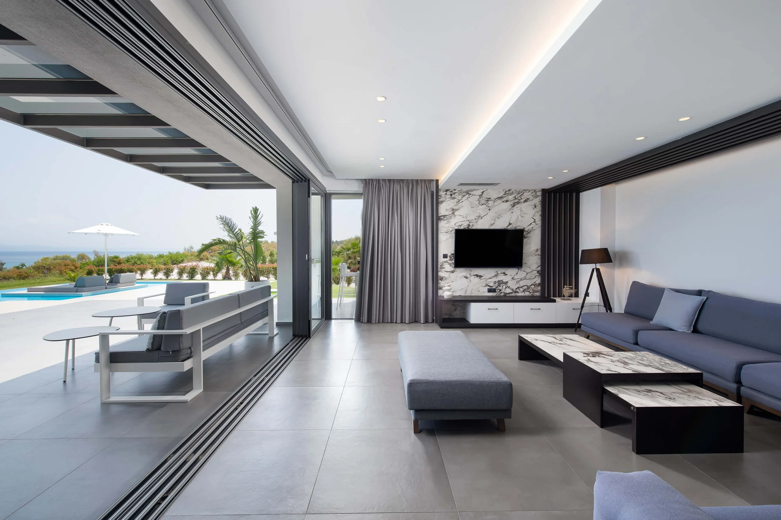 Elegant living room interior of Sapphire Villa Halkidiki with modern design and sea view