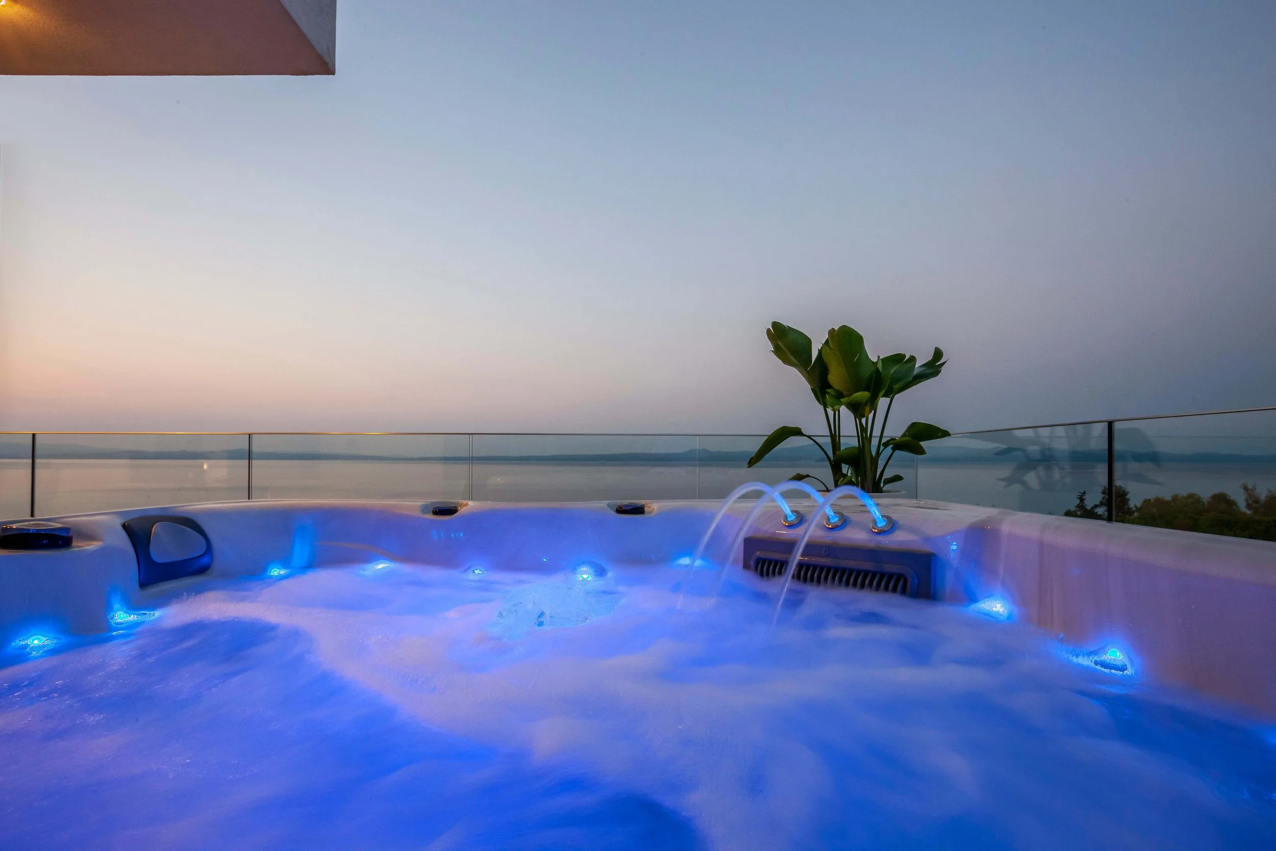 Outdoor Jacuzzi on Sapphire Villa master terrace with panoramic Aegean sea view Hanioti