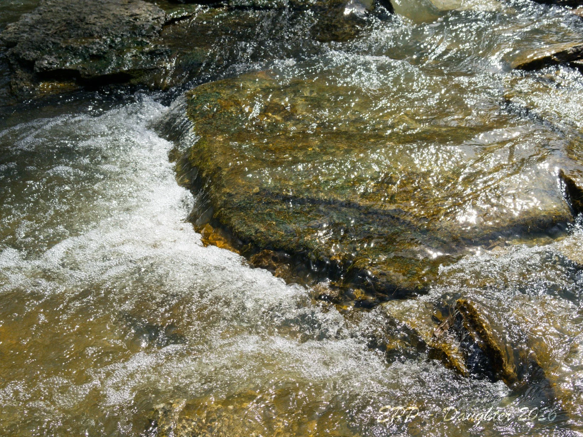 River Water gushing by Daughter Shot