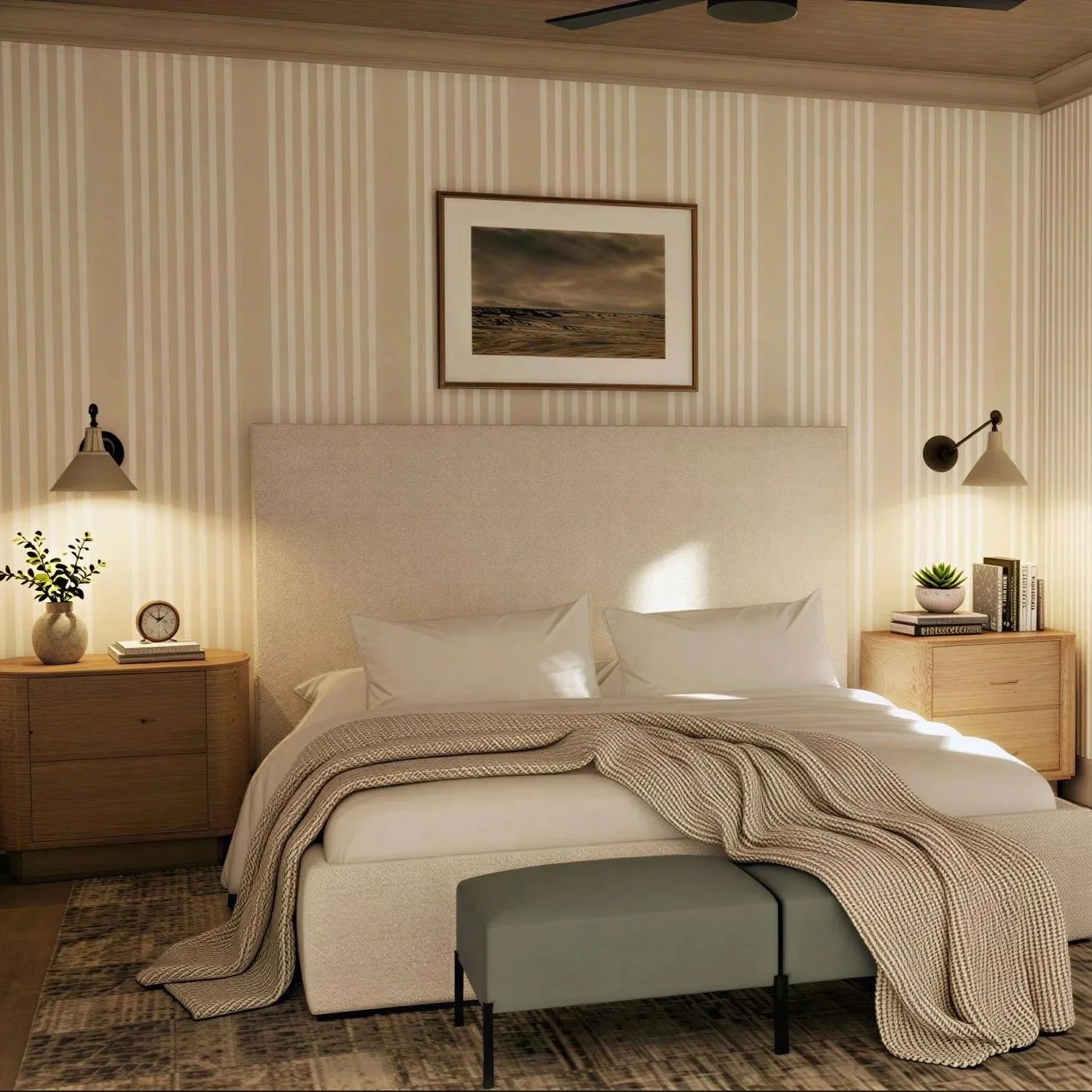 The primary bedroom features a classic stripe wall covering, paired with natural materials, and light blue accents to bring in a coastal feel. Additionally, the wood ceiling application grounds the space adding warmth.