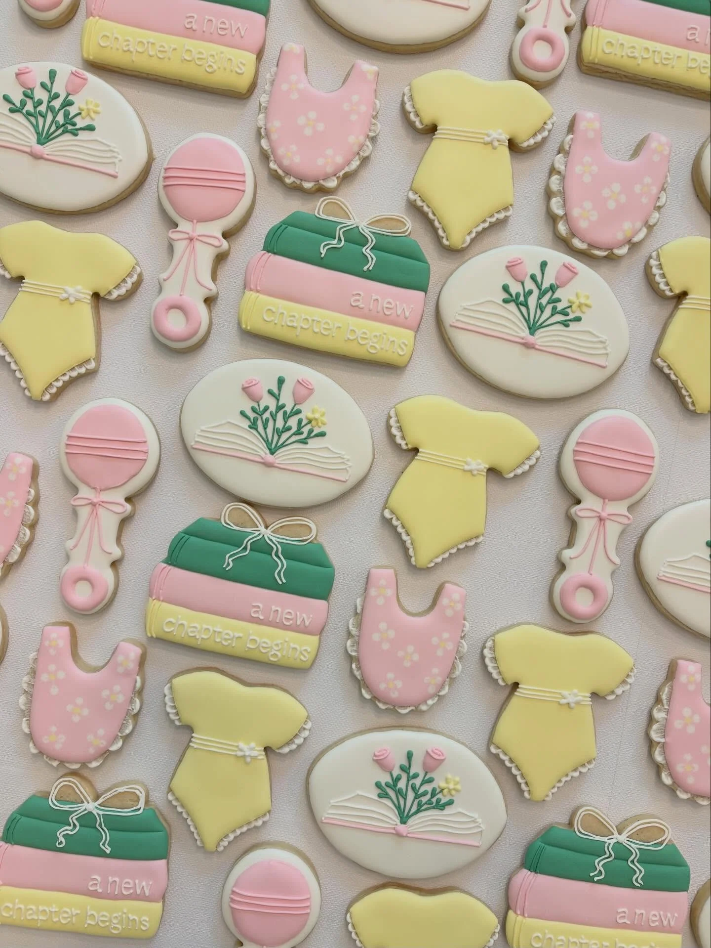 A new chapter begins 🌸📖

#homemadecookies #customcookies #sugarcookies #babyshowercookies
#wesleychapelcookies