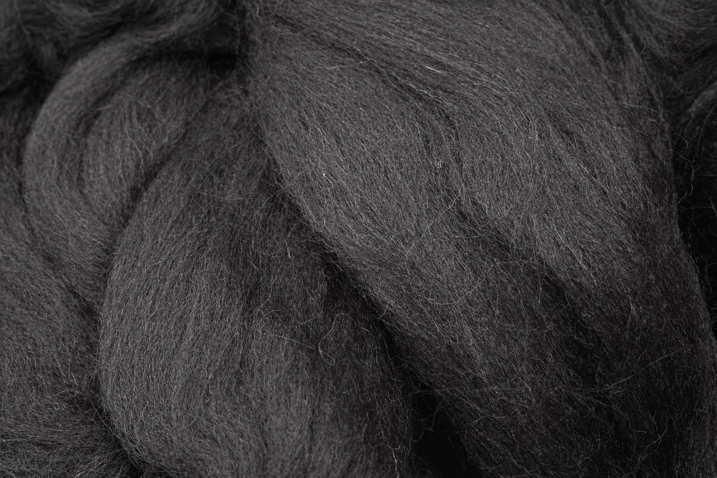 Close-up of dark gray Merino wool.