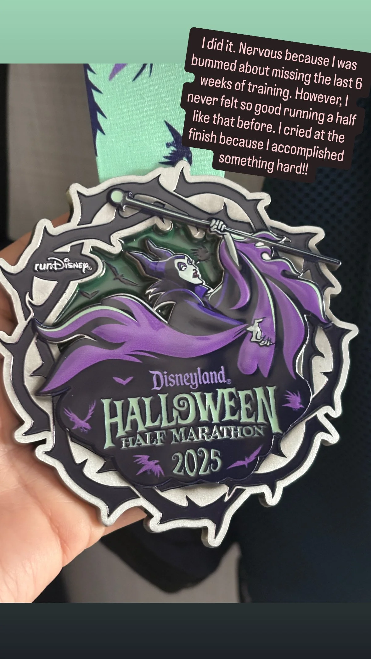 Medal for Disneyland Halloween Half Marathon 2025 featuring Maleficent from Disney with a purple cloak and horn, set against a black background with purple bats and the event details.