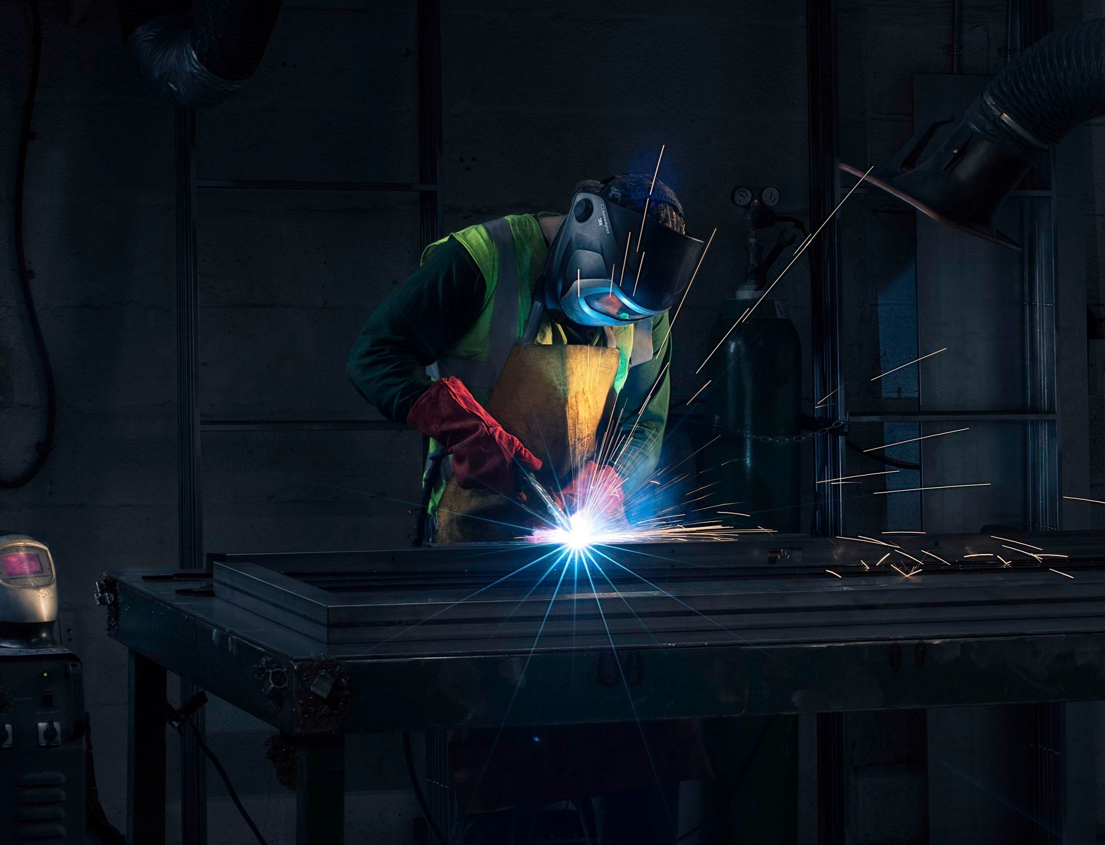 corporate-industrial-photography-engineer-welding-sparks---+%281+of+1%29.jpg