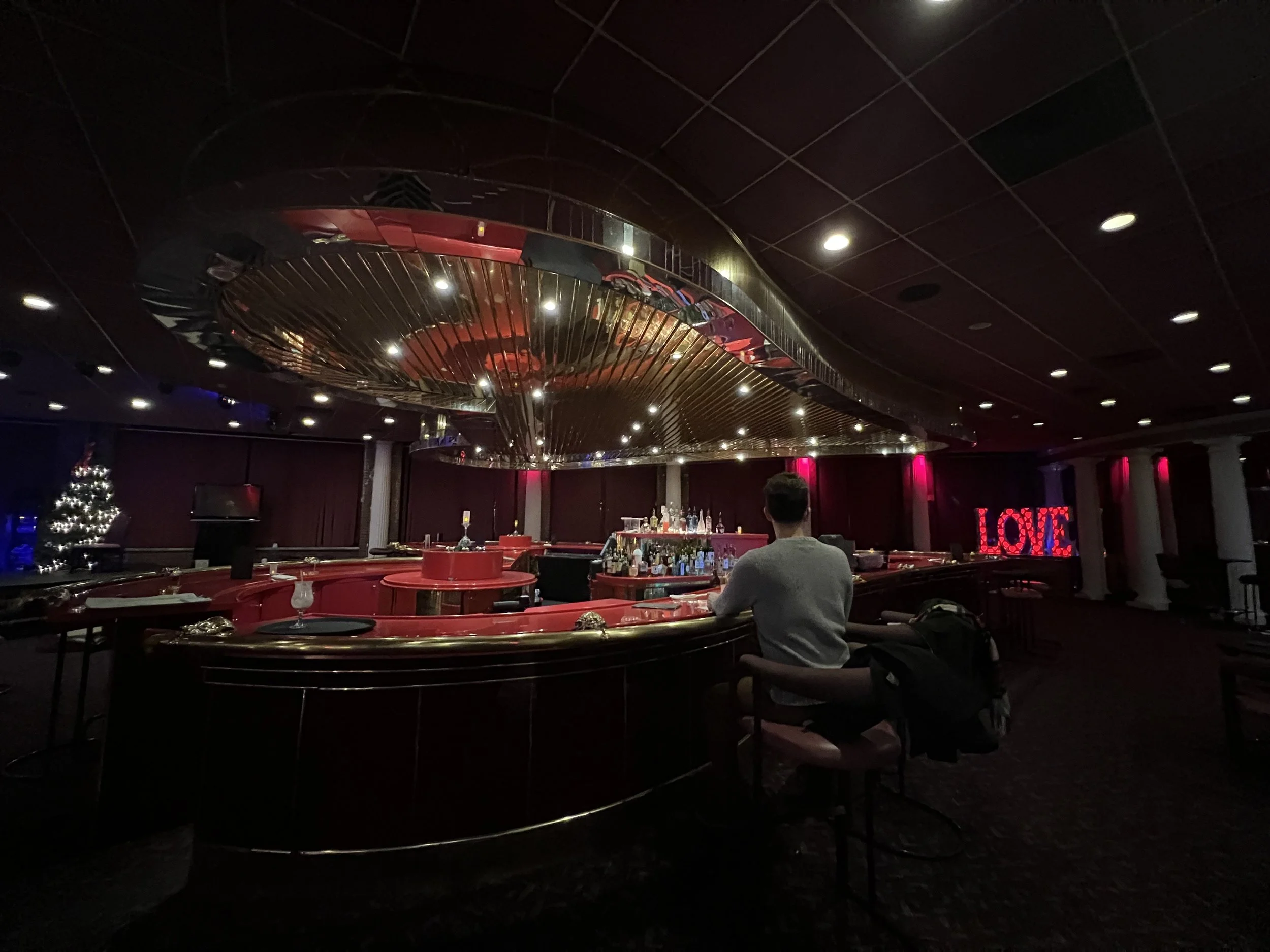 Maximalist hotel lobby bar interior design