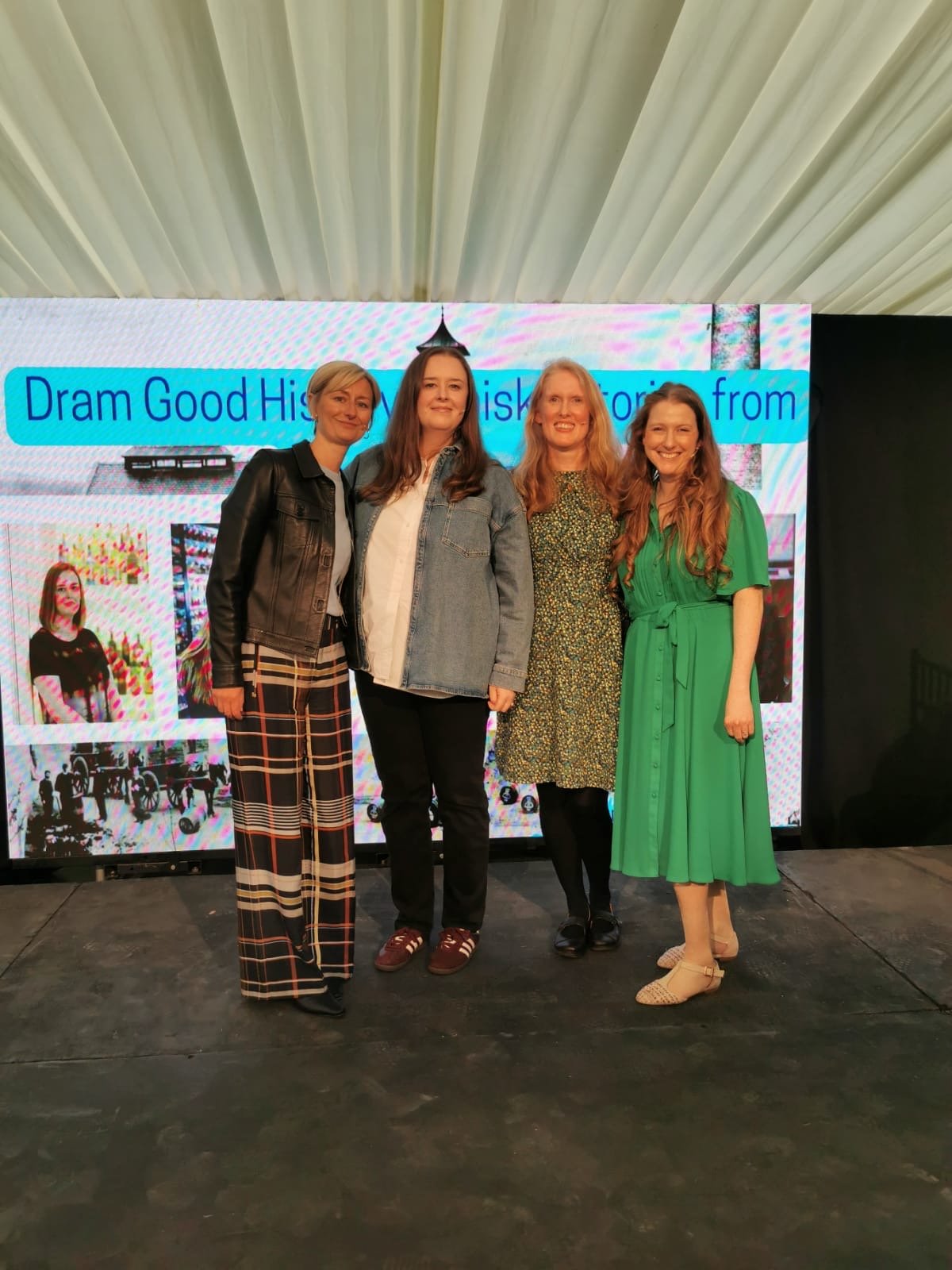 Four women standing together for Whisky Archive event