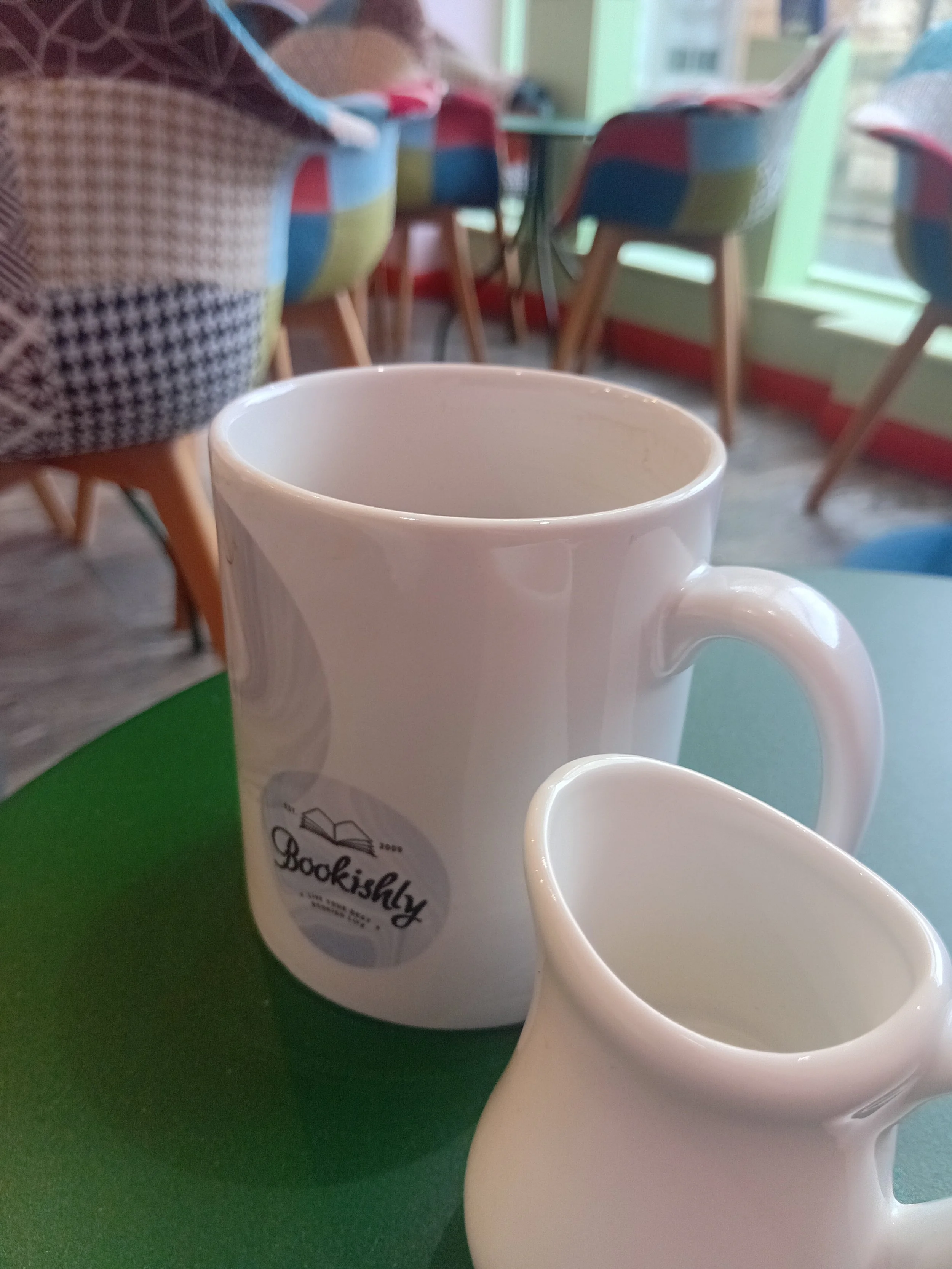 Two coffee mugs on a table: let's grab a cuppa and create a clear path to support your successful business.