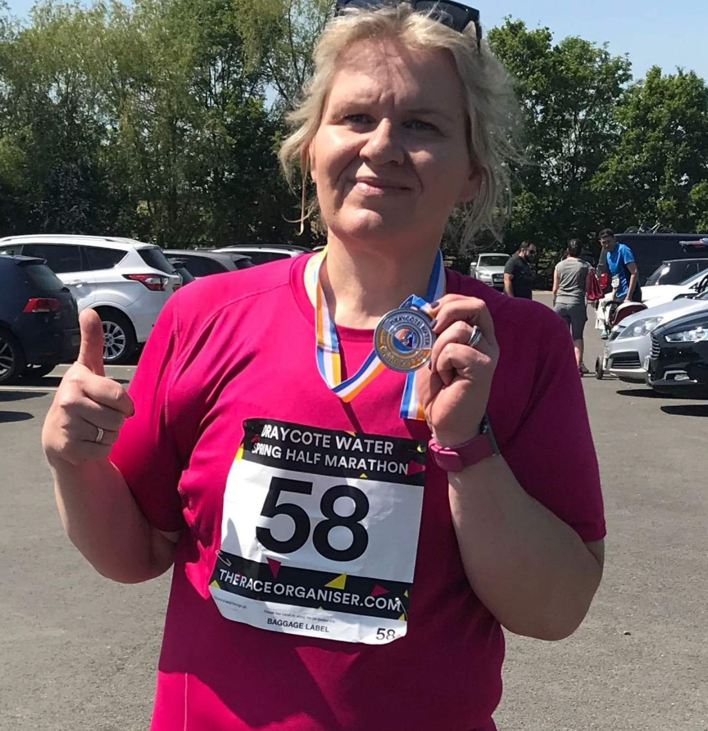 Andrea celebrating her half marathon