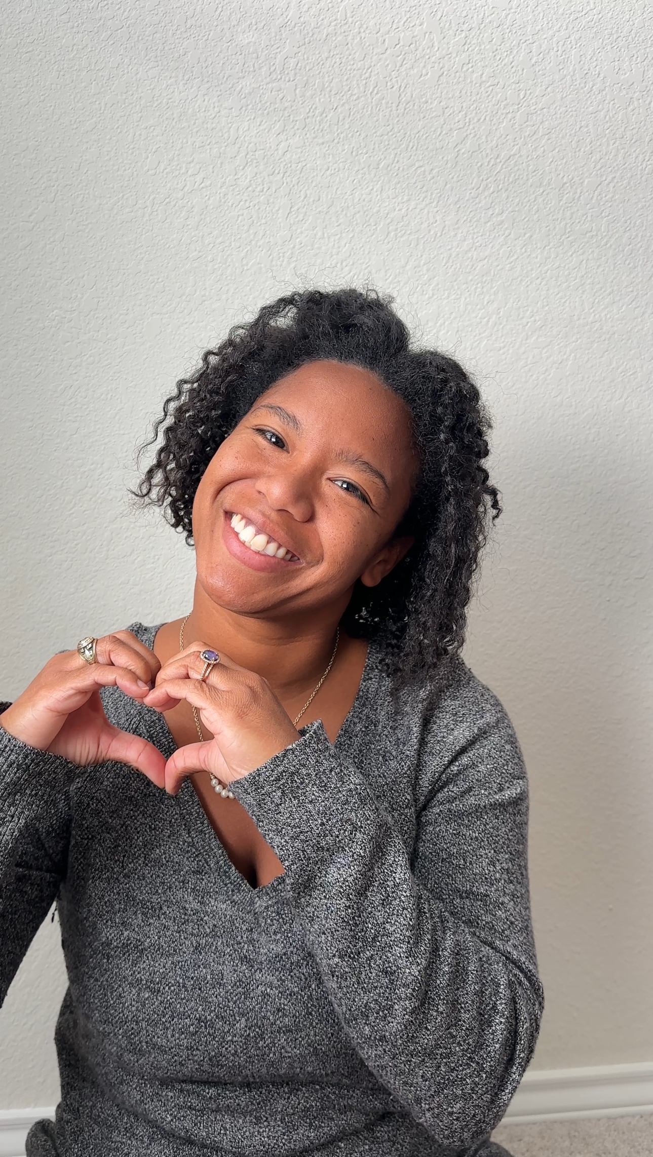 black female therapist with warm smile