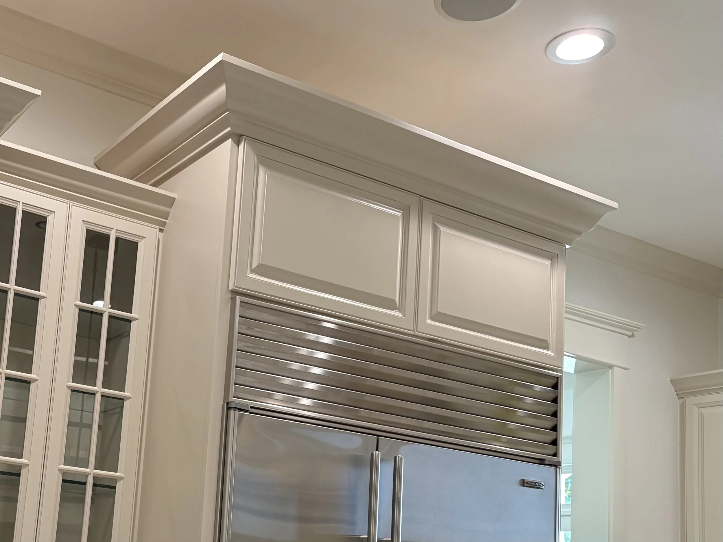 Custom built-to-match raised panel cabinet doors