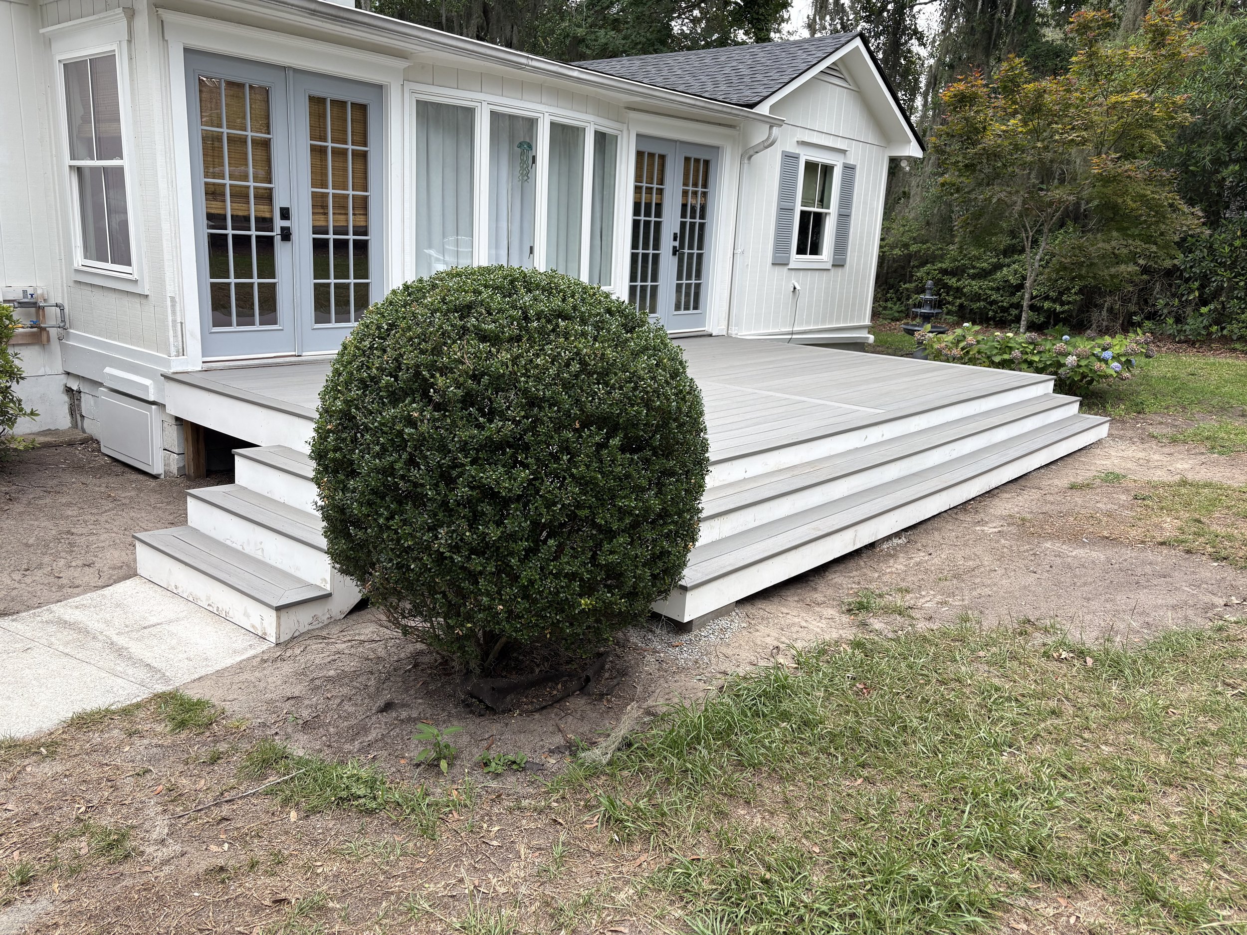 Replaced wooden decking with TimberTech composite boards, built stairs and added pvc fascia