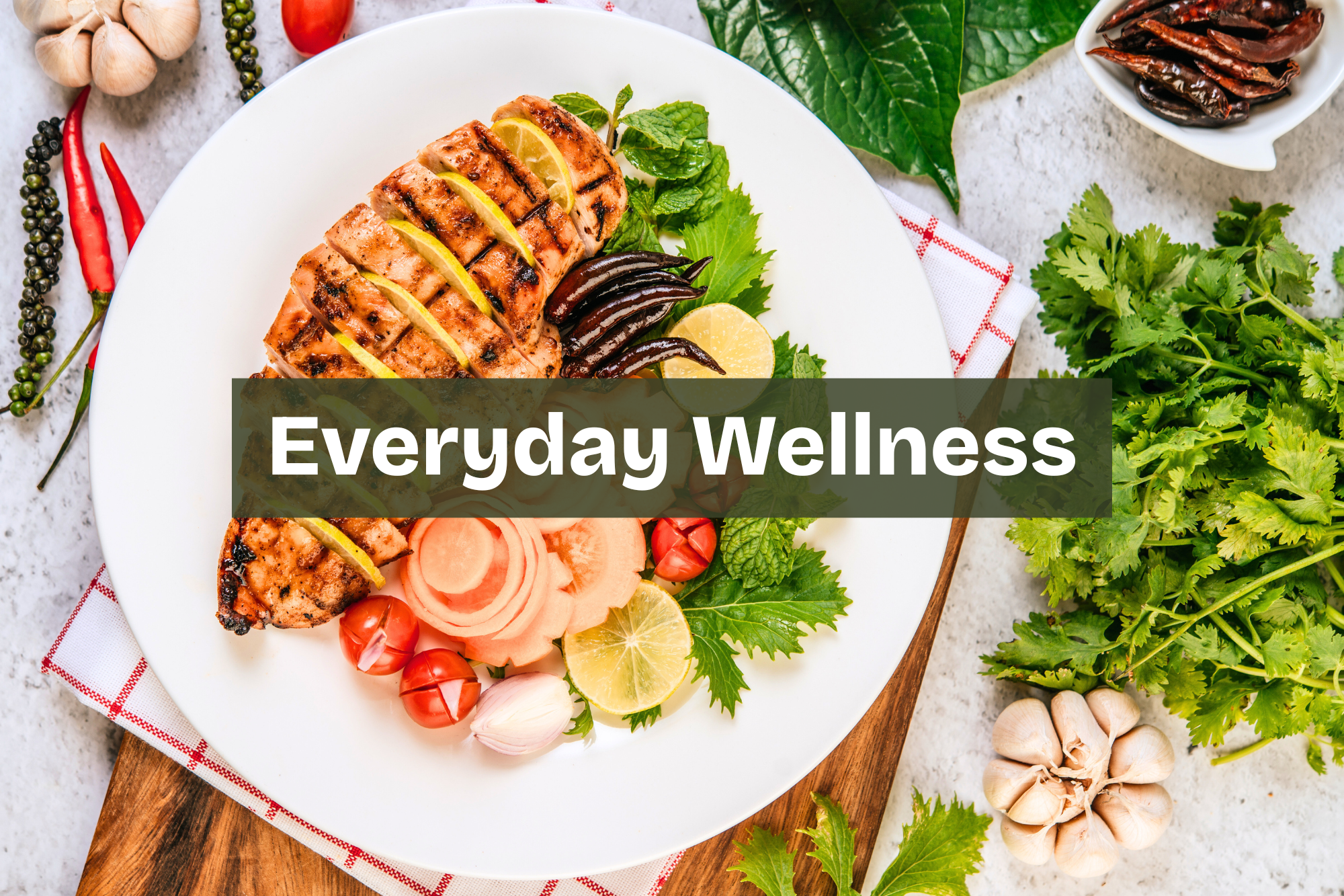 A plate with grilled salmon topped with lemon slices, garnished with green herbs, and accompanied by cherry tomatoes, sliced onions, and lemon slices. Showcasing Nourix's Everyday Wellness Meal Plan. Balanced portion meal for healthy lifestyle Nourix