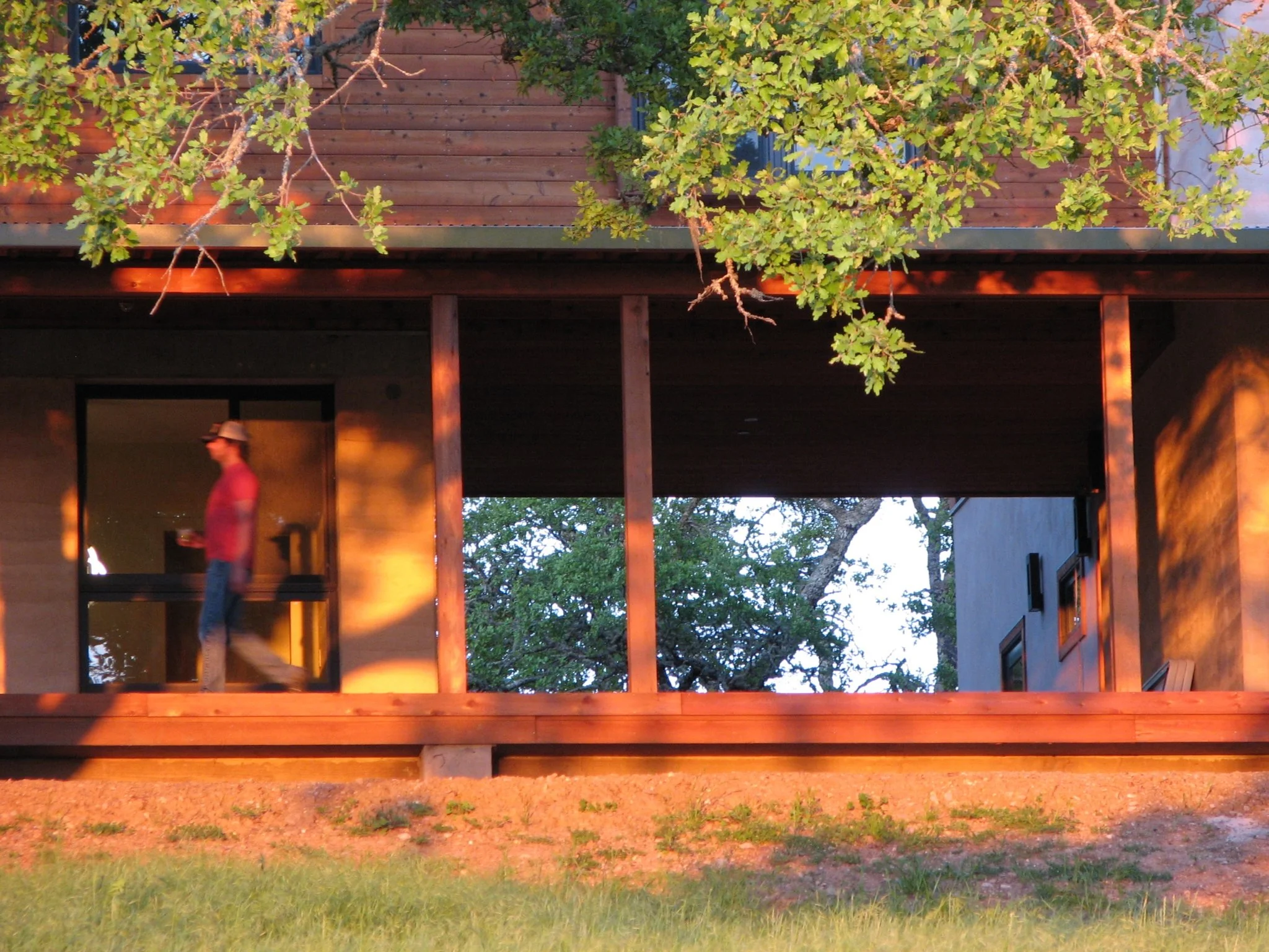 Image of original home porch in summer.