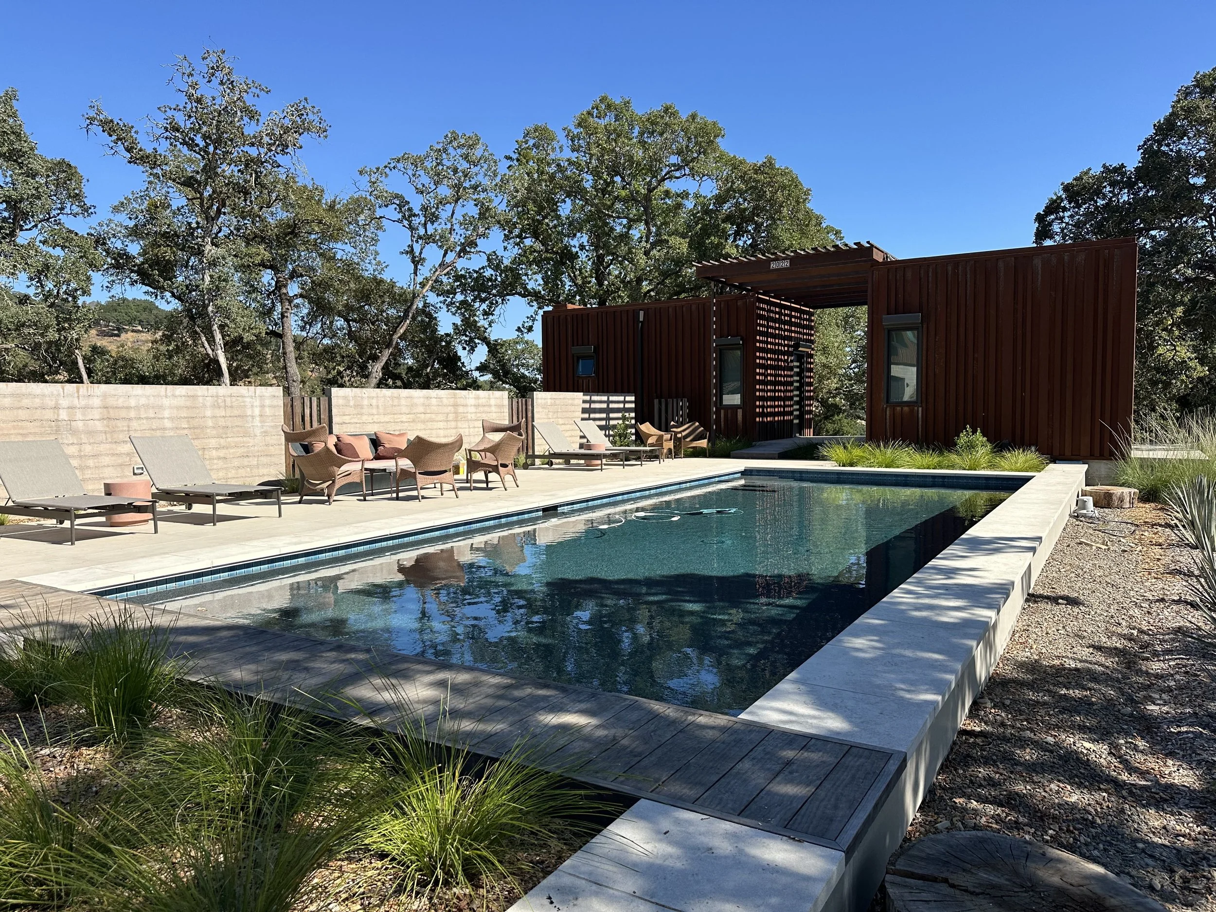 An image of the new pool and guest house.