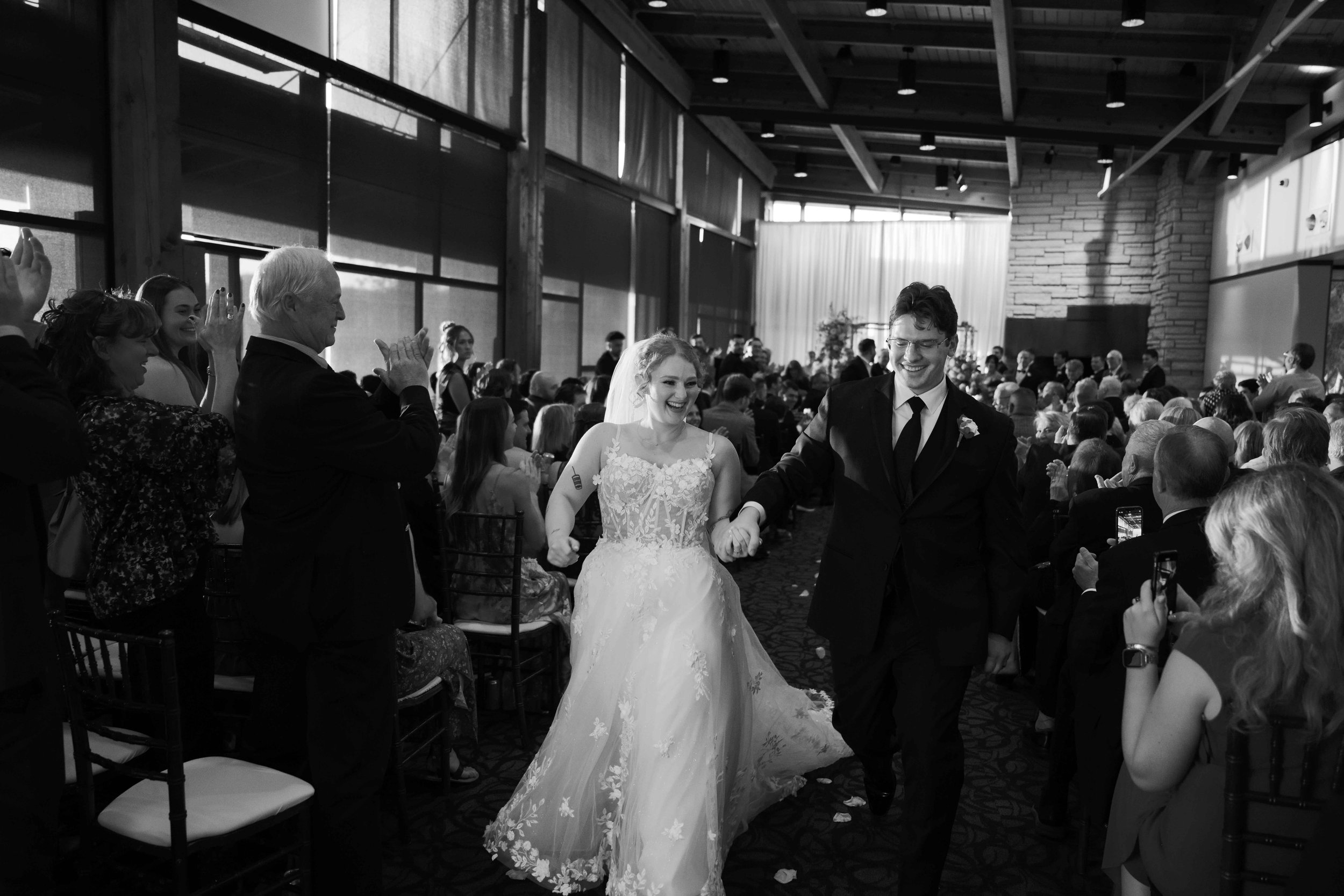 Black and white recessional at Independence Grove Forest preserve wedding