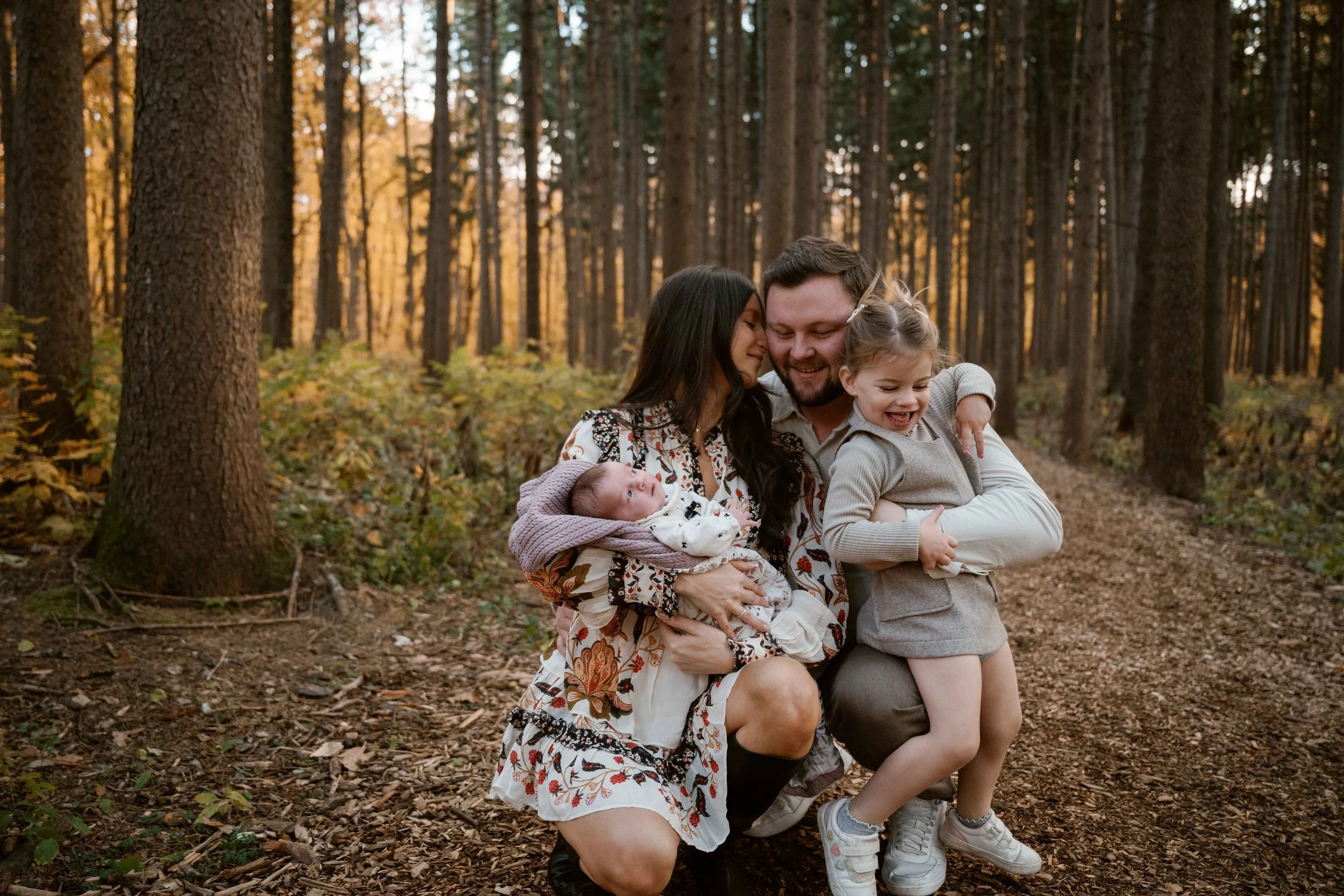whispering sweet things in dads ear at Morton Arboretum Lisle IL 