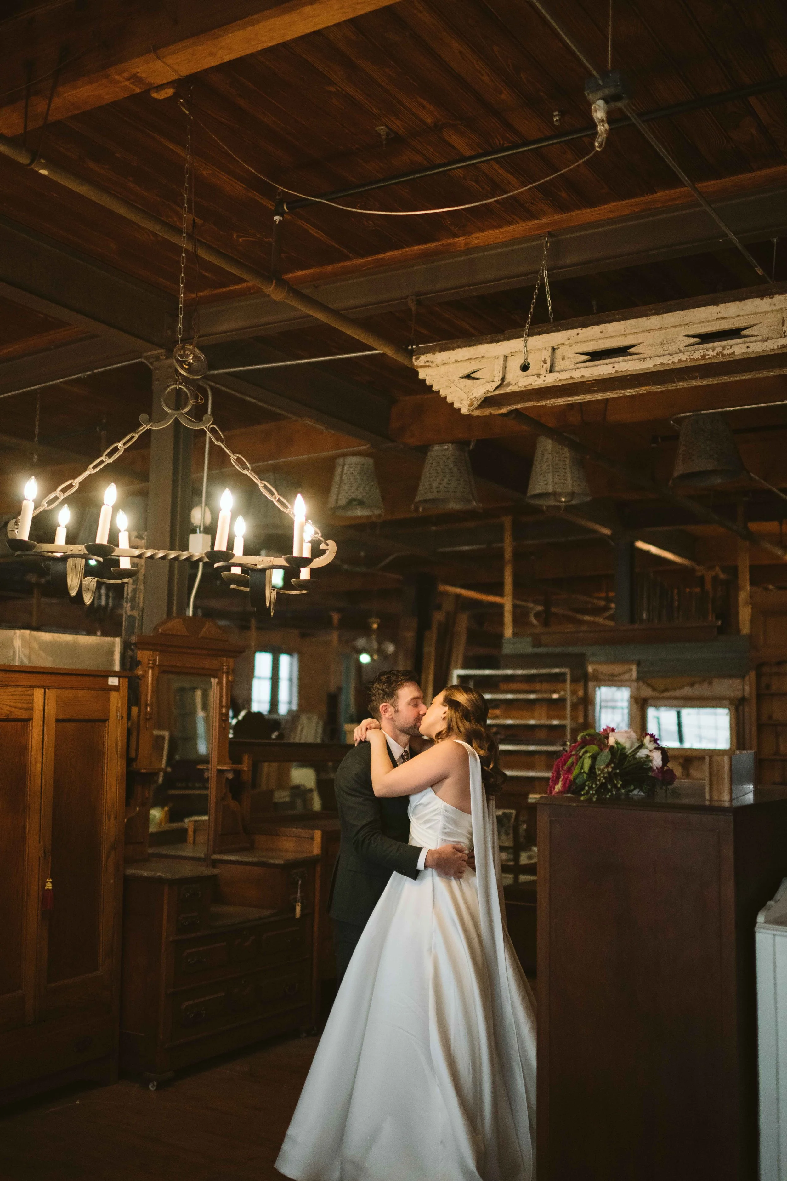 bride and groom kissing at Salvage One in Chicago IL
