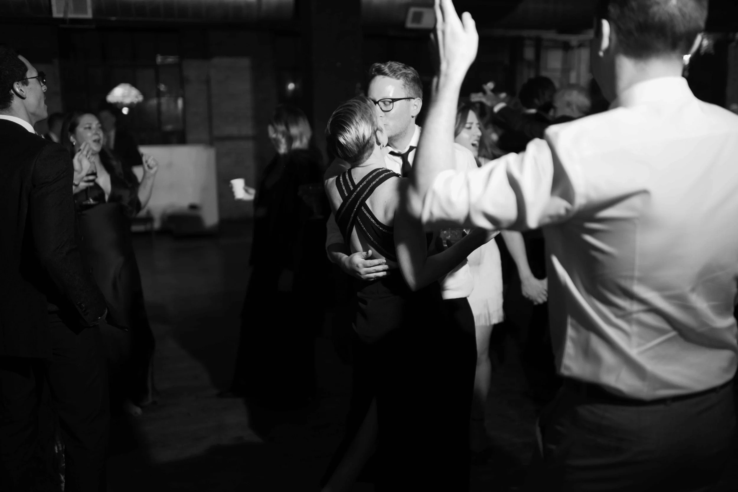 salvage one chicago black and white dancing photo of guests kissing