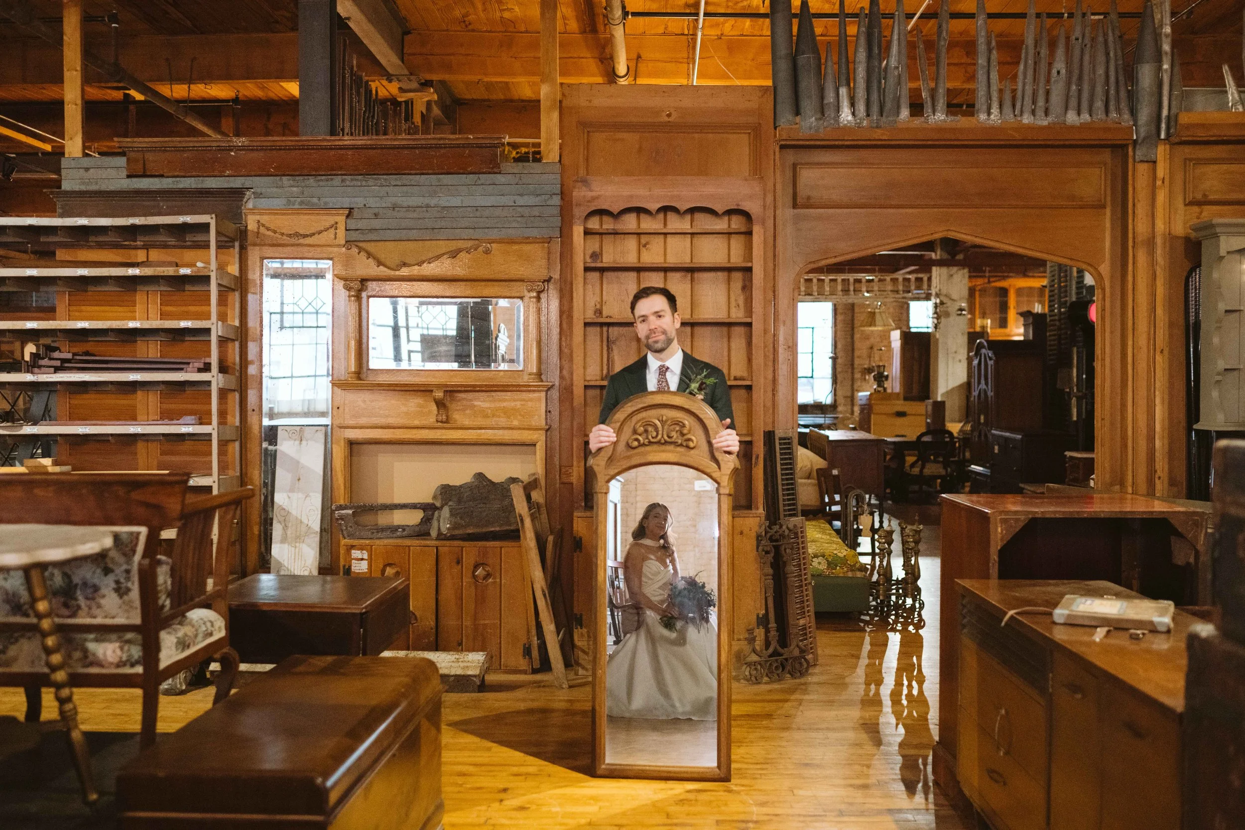 Bride reflection in antique mirror at Salvage One in Chicago