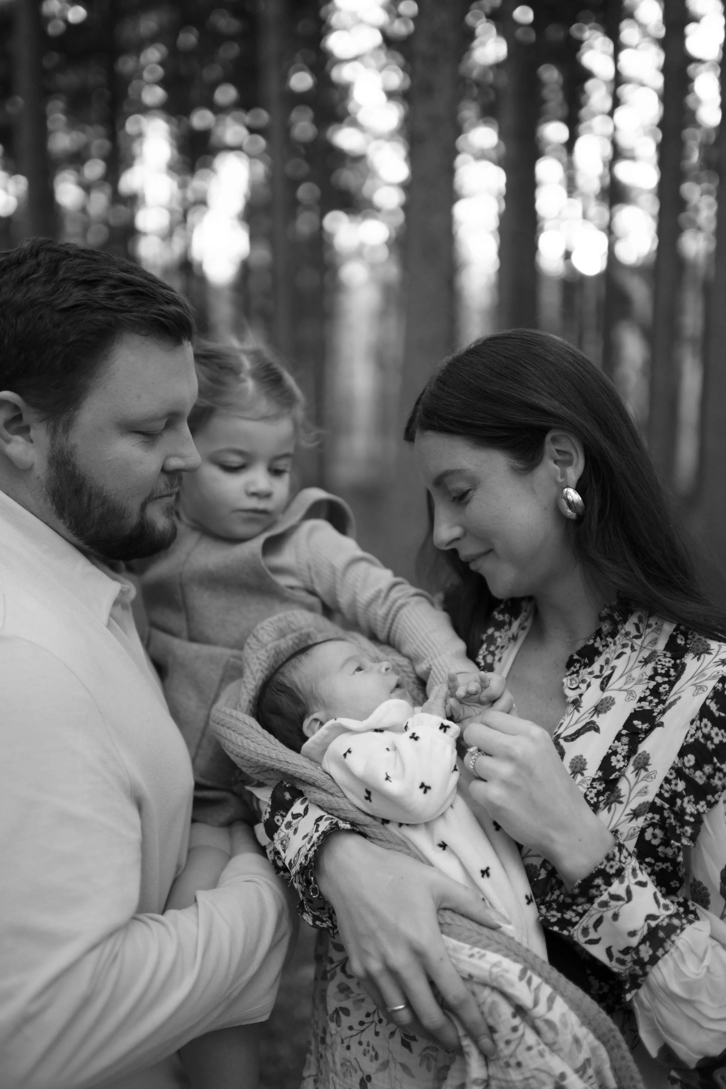 snuggling newborn outside at Morton Arboretum Lisle IL 