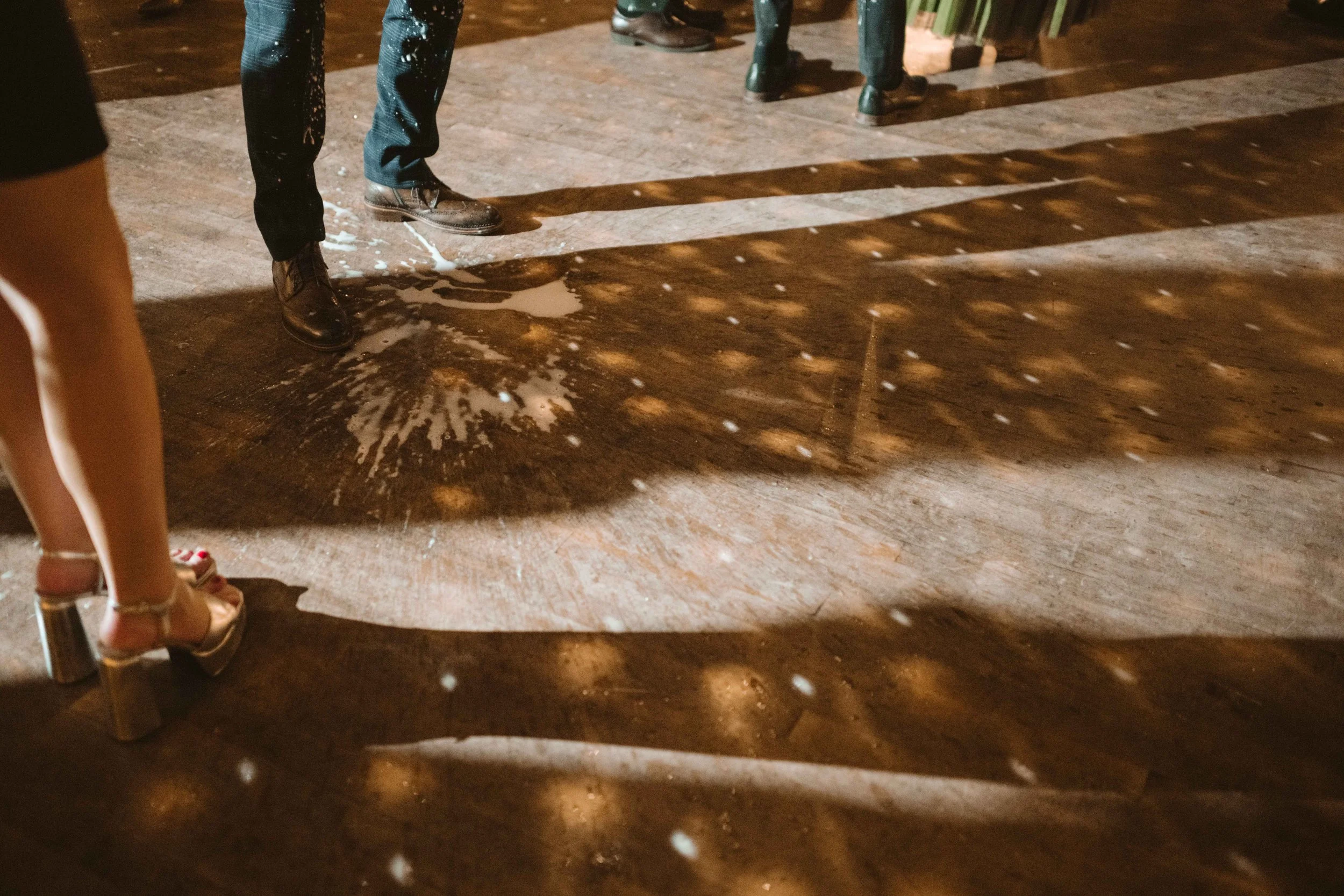 salvage one chicago wedding reception drink spill on the ground