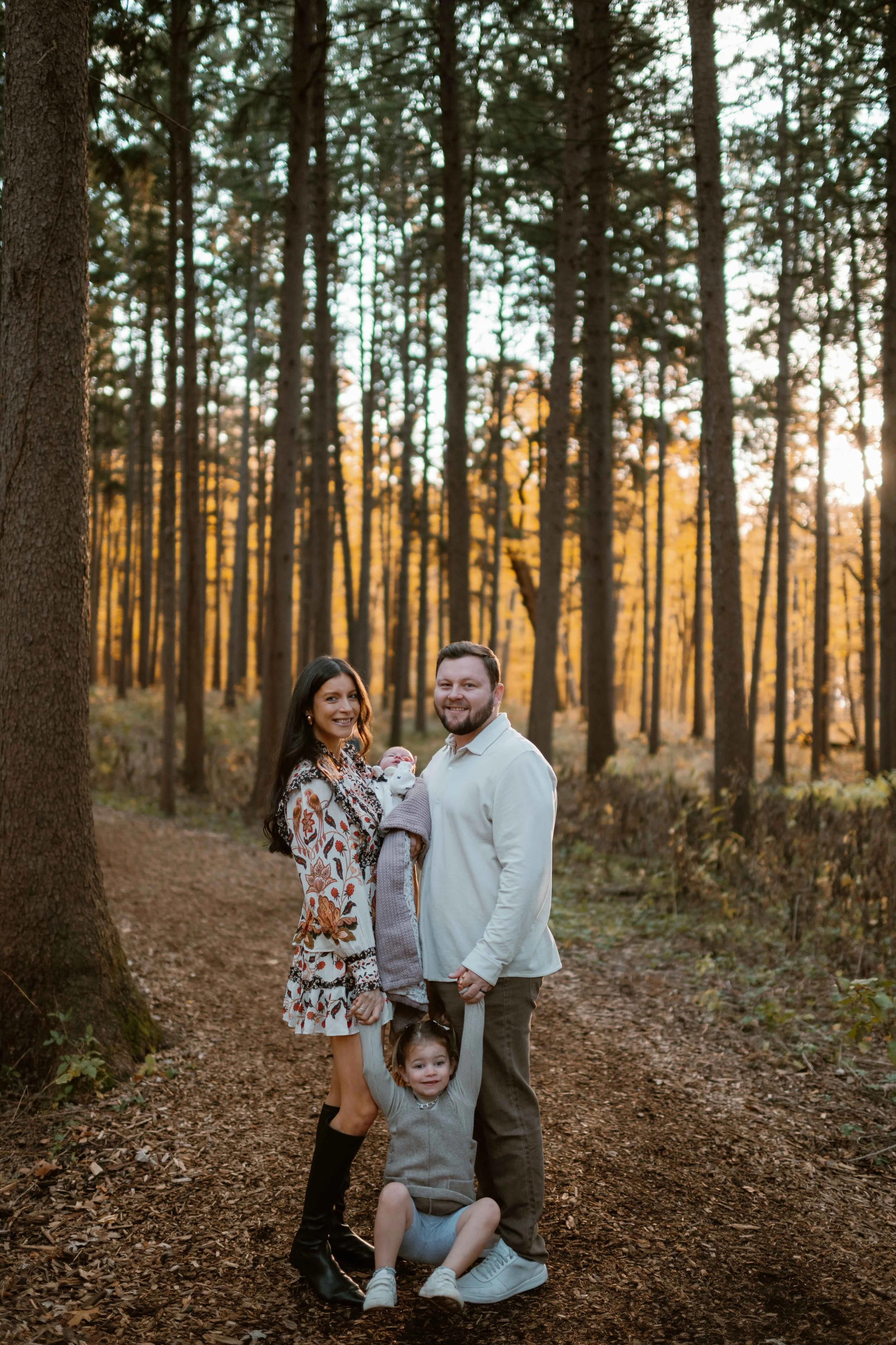 family photo smiling in the fall at Morton Arboretum Lisle IL 