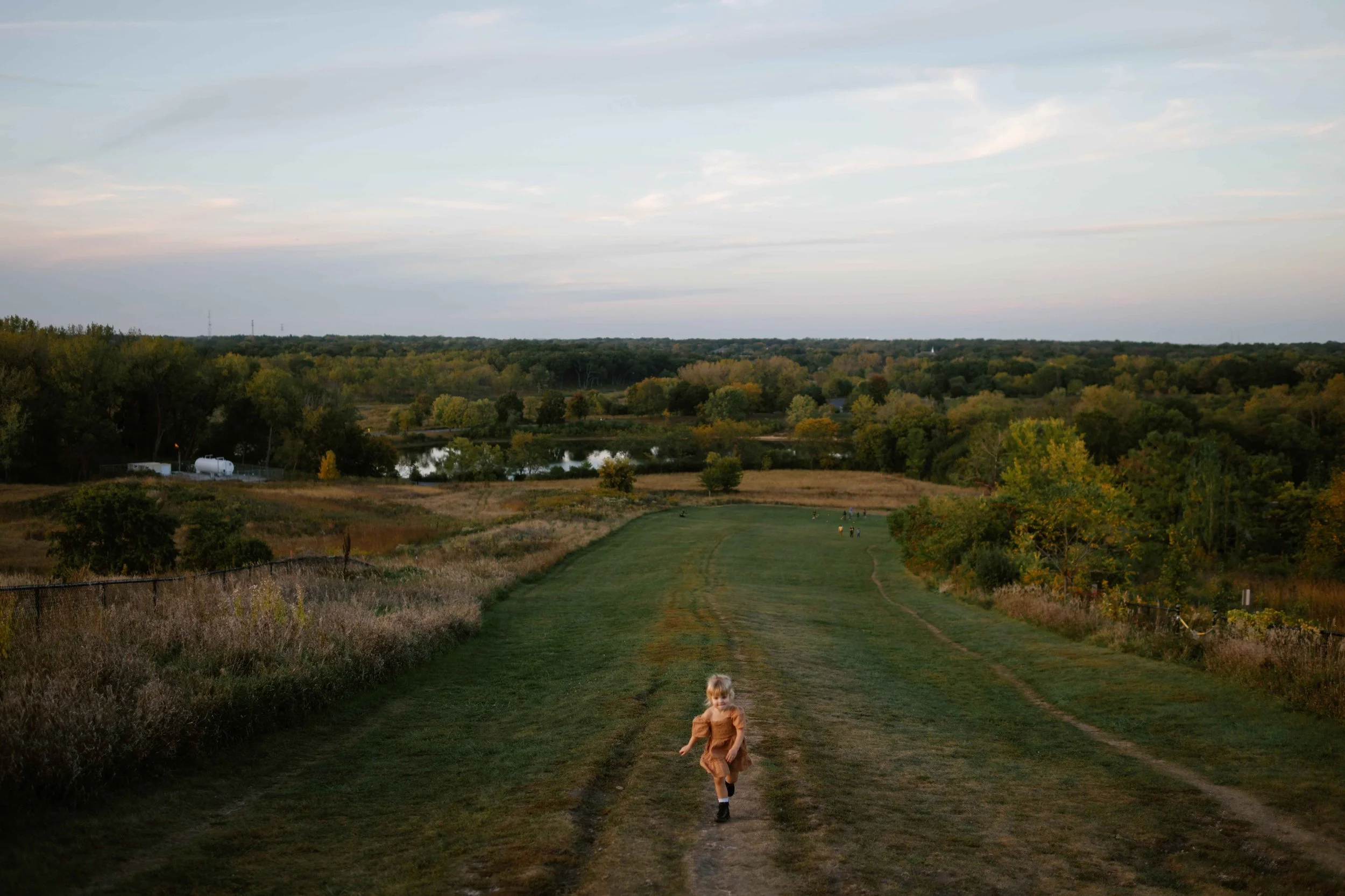 3 year old Running down Mt. Hoy at Blackwell Forest Preserve In Wheaton