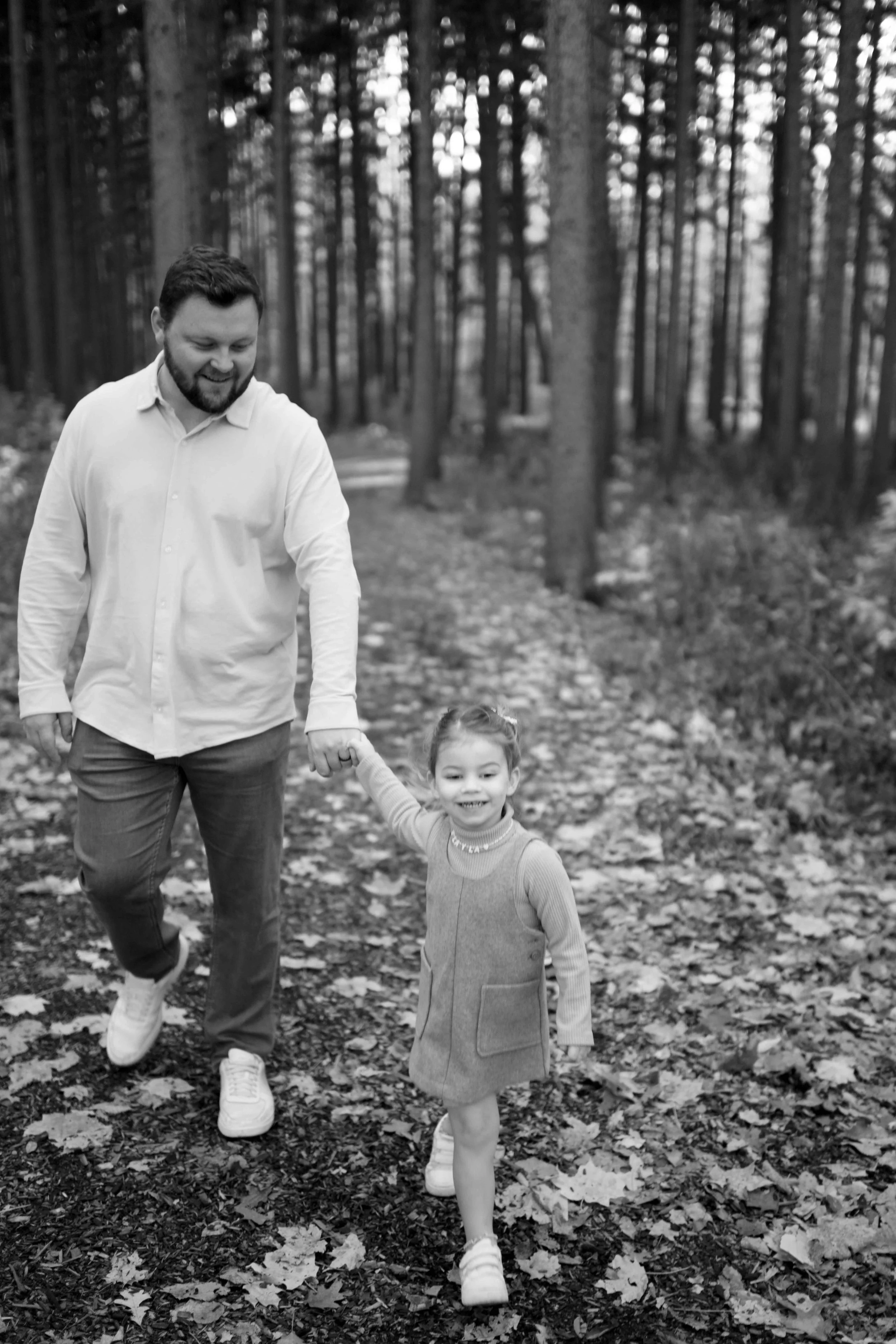 daughter walking with dad at Morton Arboretum Lisle IL 