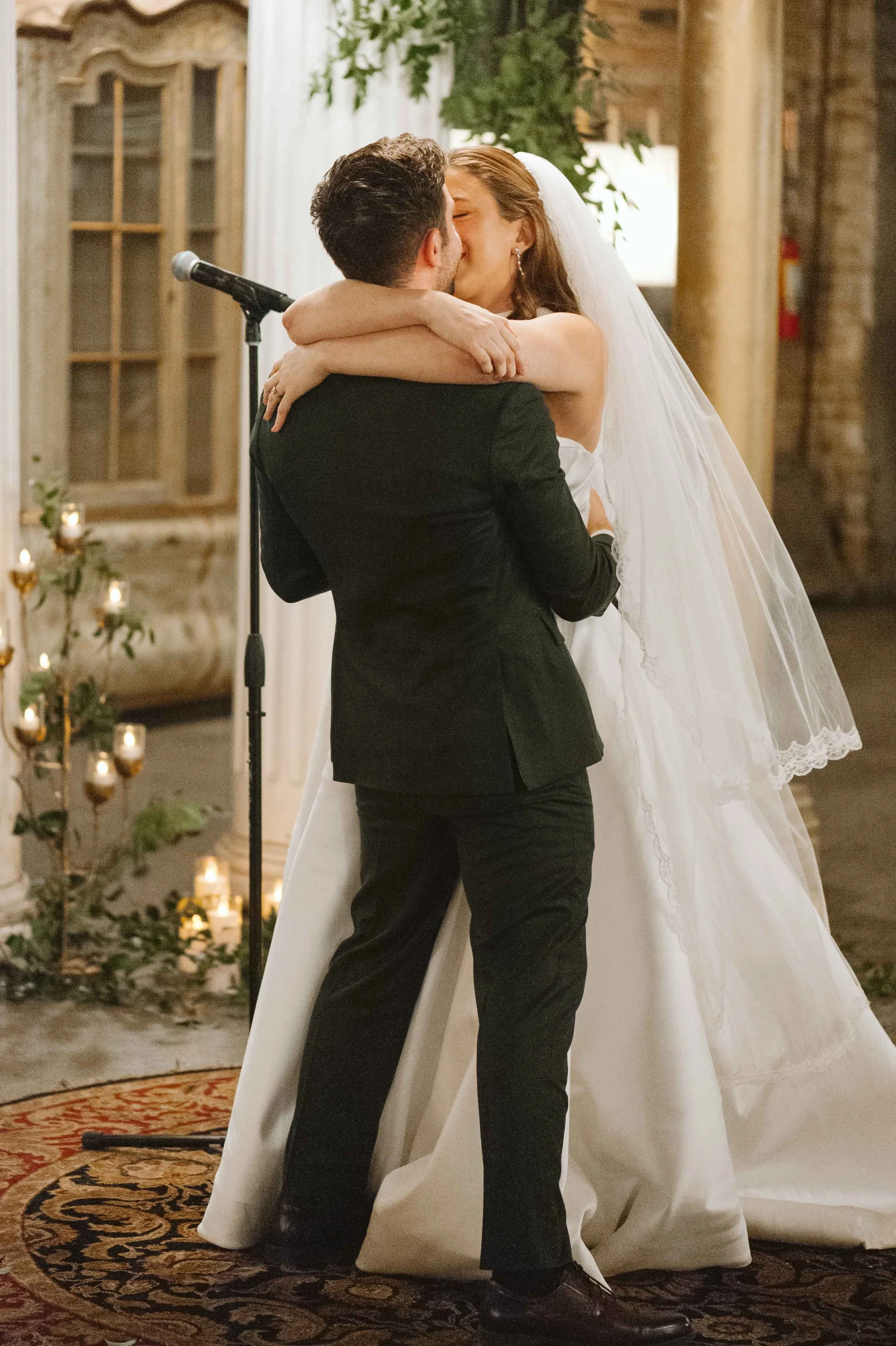 salvage one, chicago IL wedding ceremony the first kiss 