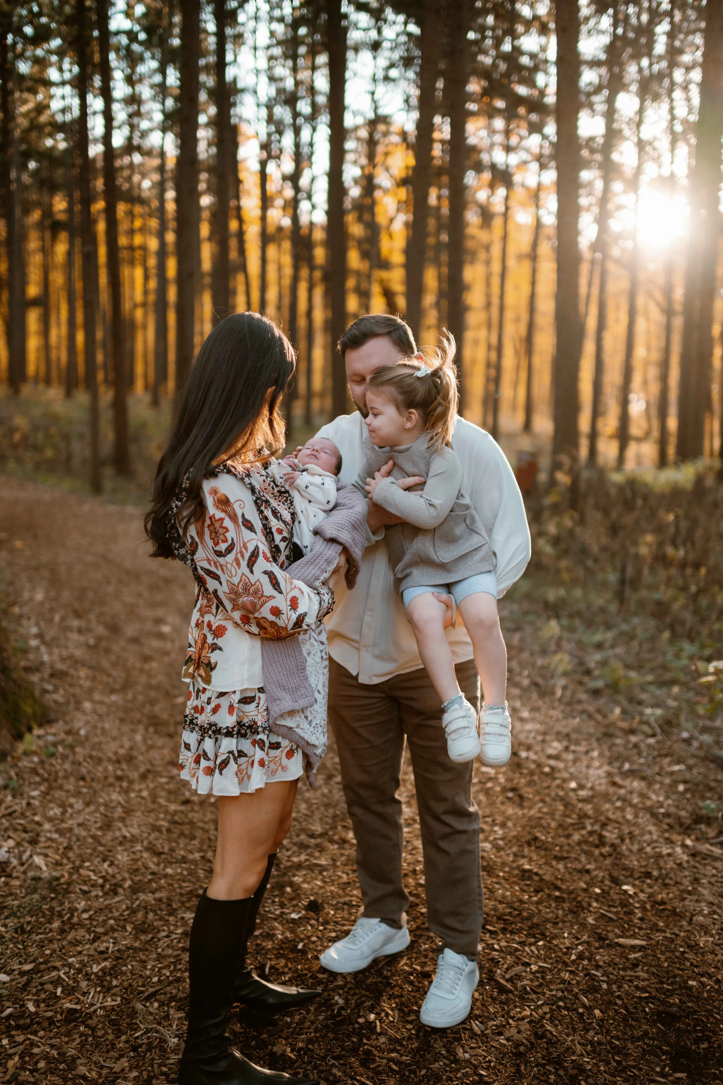family photo admiring new baby at Morton Arboretum Lisle IL 