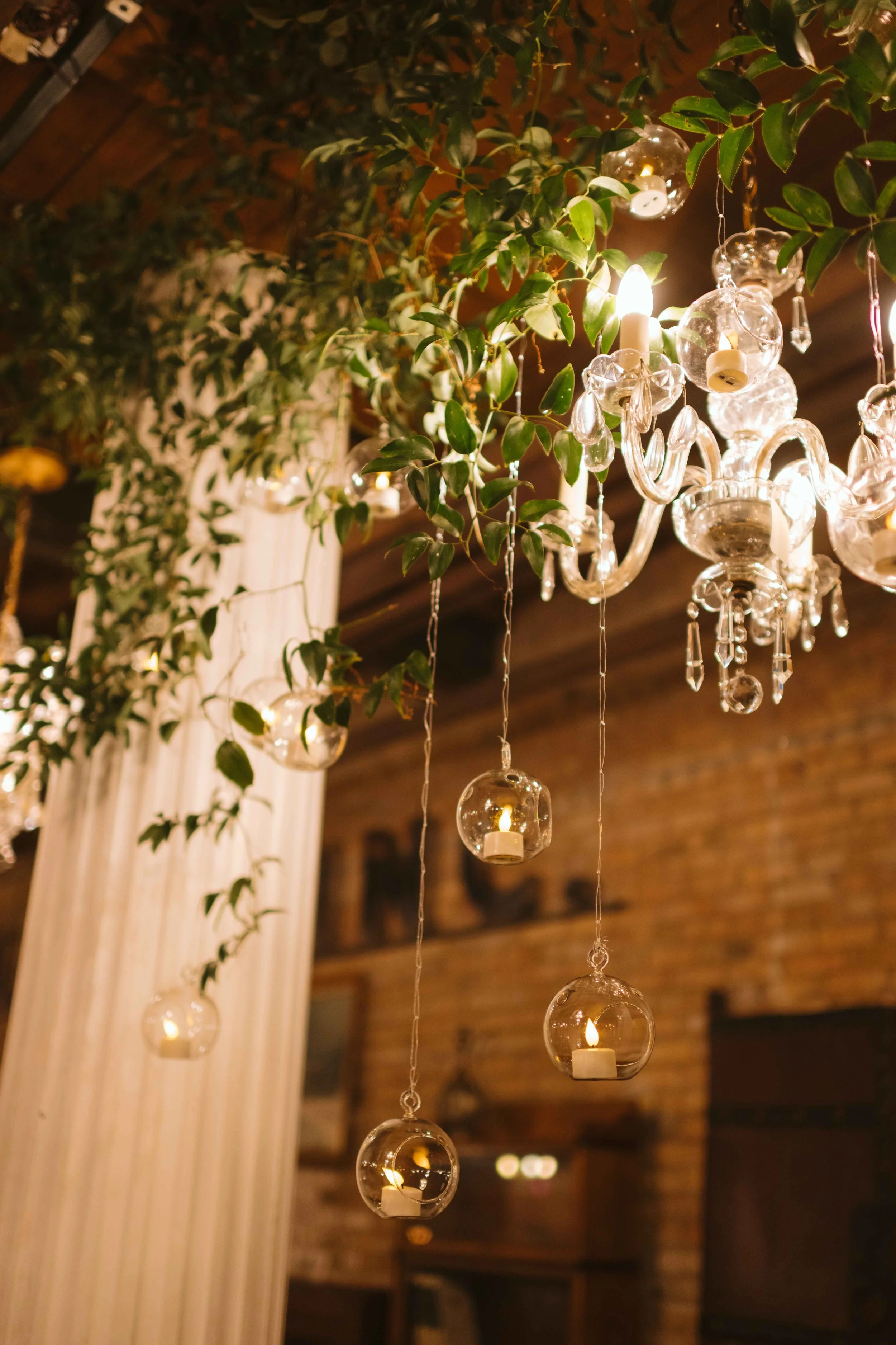 Candles and greenery at ceremony spot at Salvage One in Chicago IL