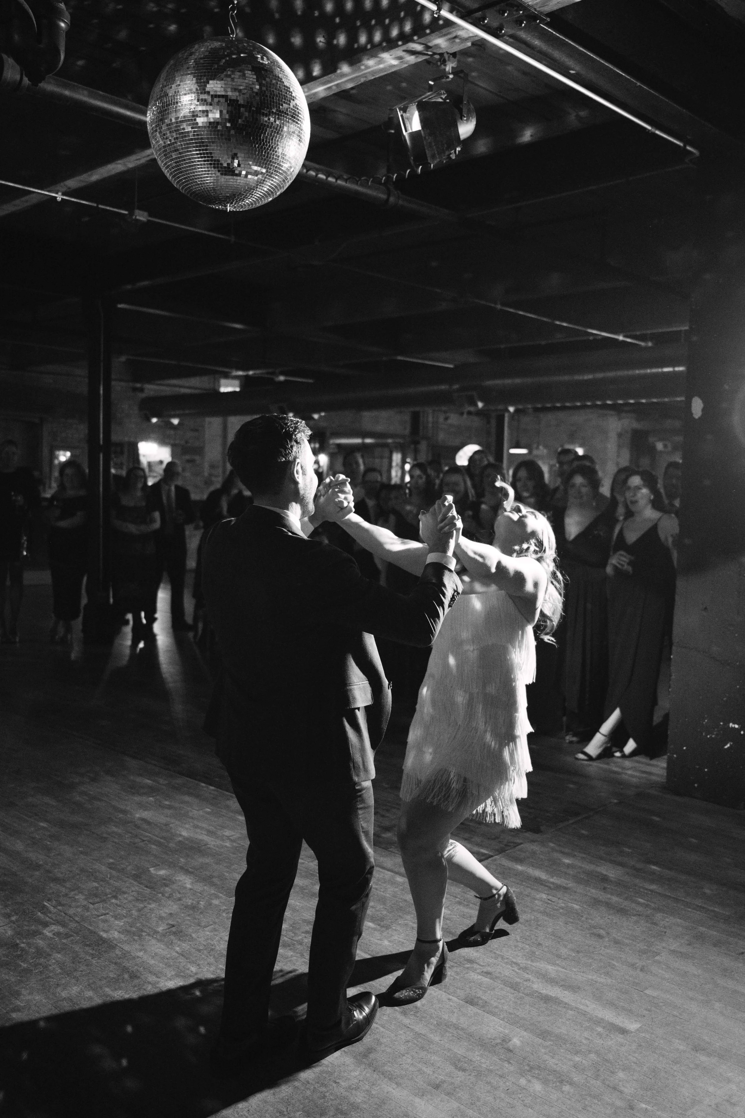 salvage one chicago wedding reception first dance of bride and groom 