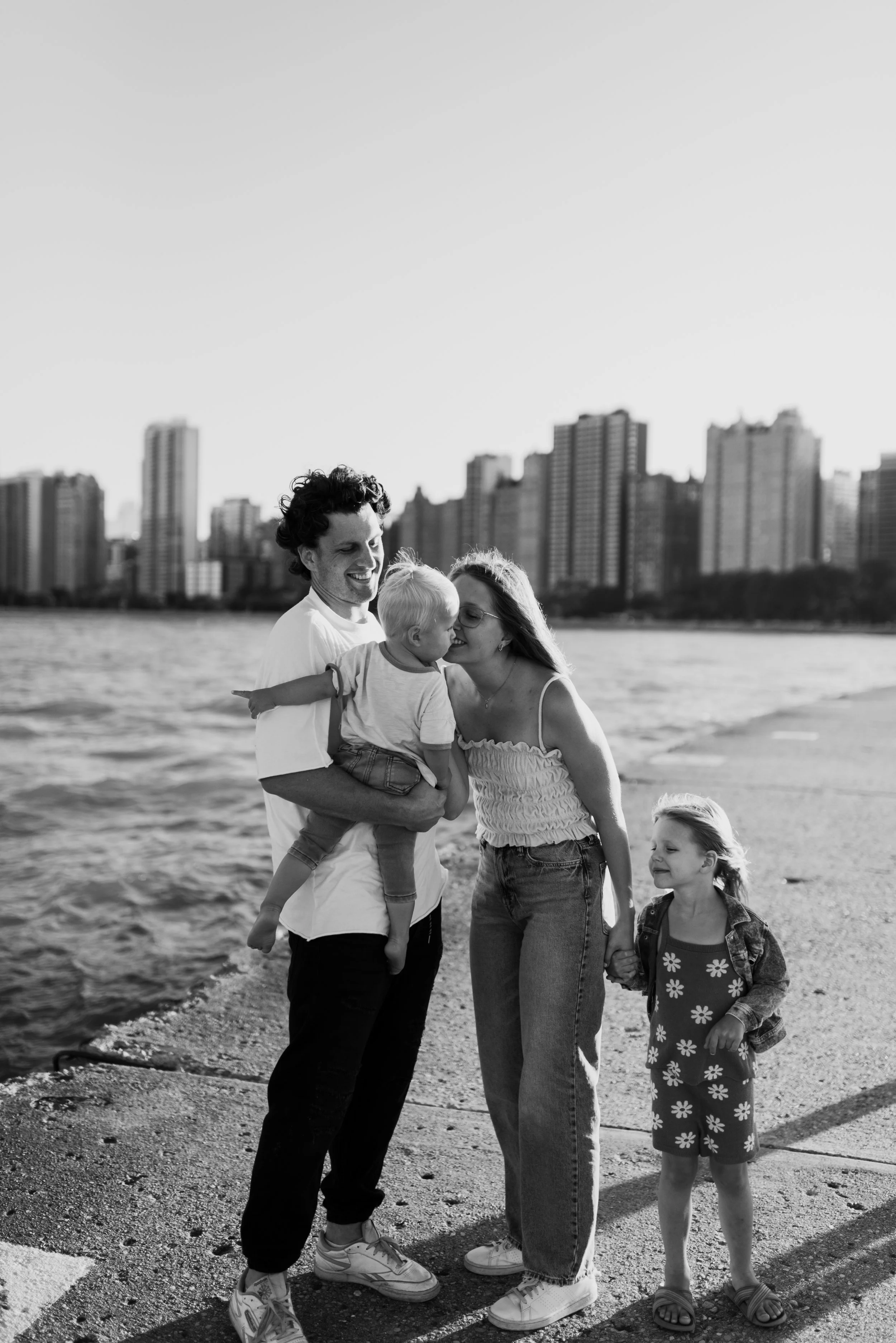 Family black and white photo at beach downtown Chicago