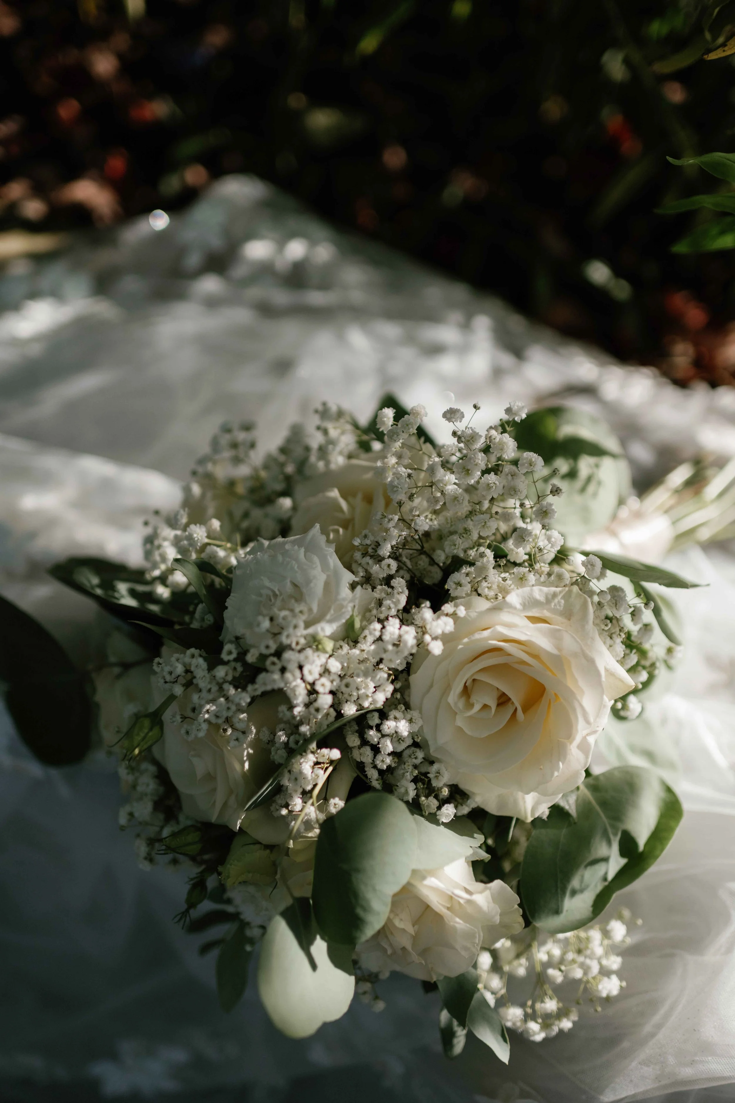 Classic wedding bouquet with white roses and baby breath