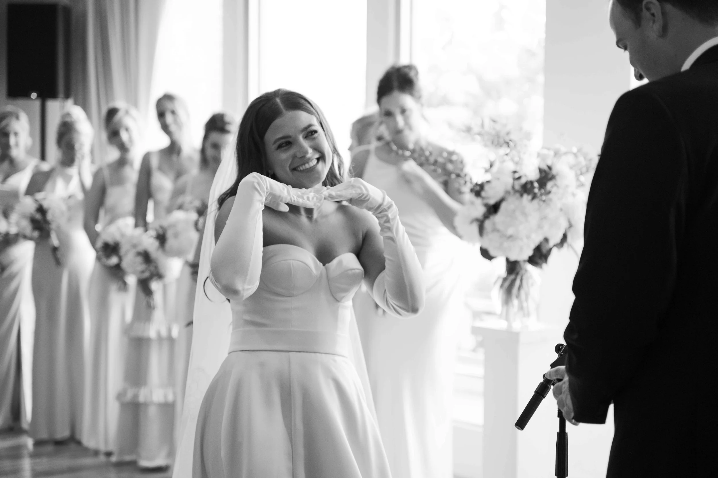 Bride making silly face at her groom during her wedding ceremony